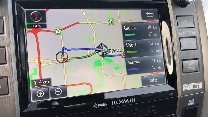 How do I turn up the volume on my Navigation system?