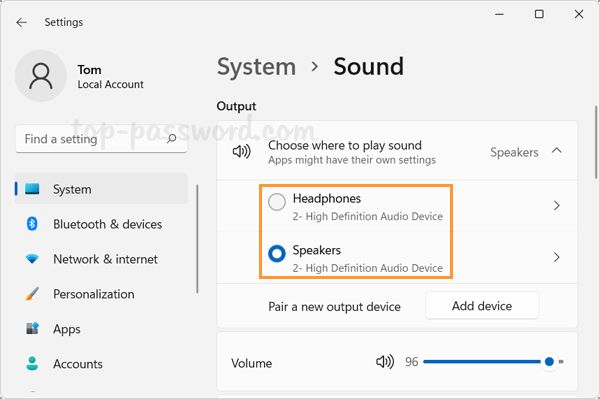 How do I switch between audio outputs?