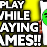 How can I play music while playing a game on my phone?