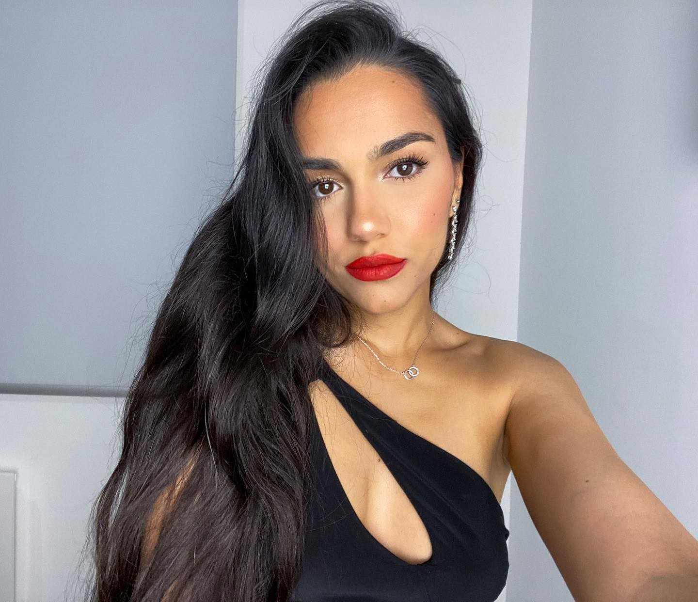 Sleek Long Hair with a Bold Red Lip