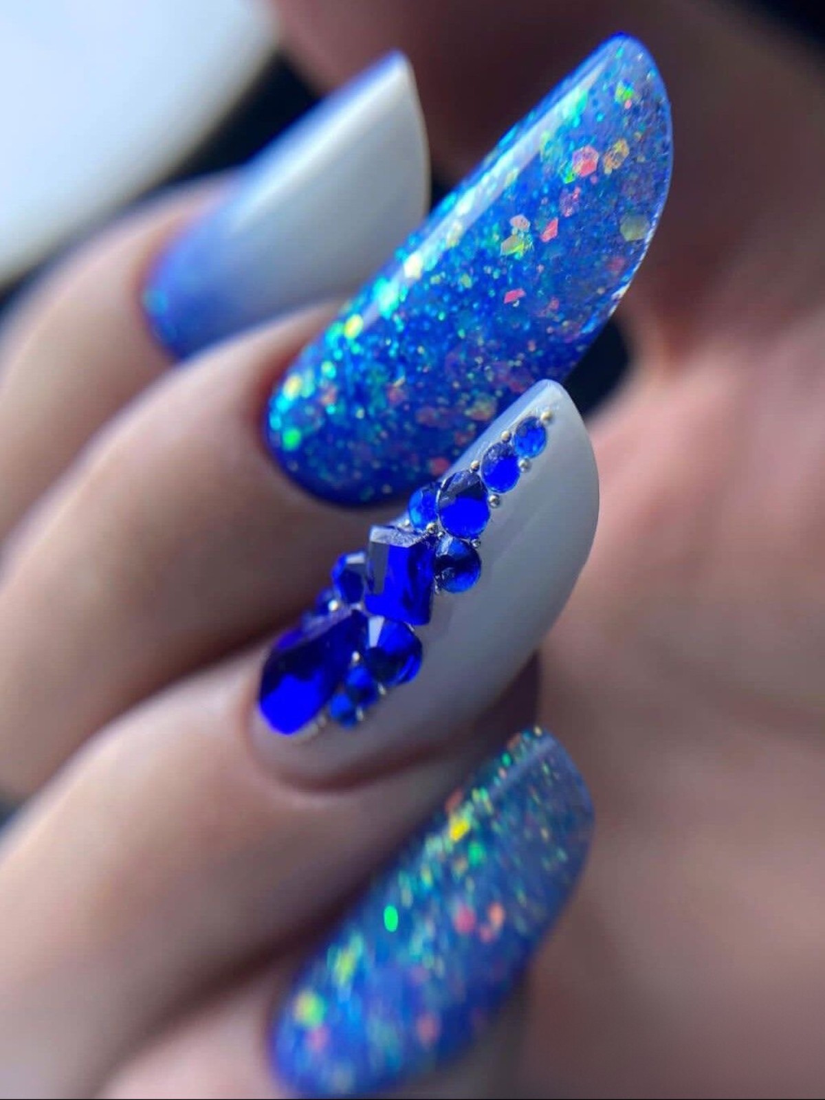 Cosmic Sparkle: Vibrant Glitter and Sapphire Embellishments