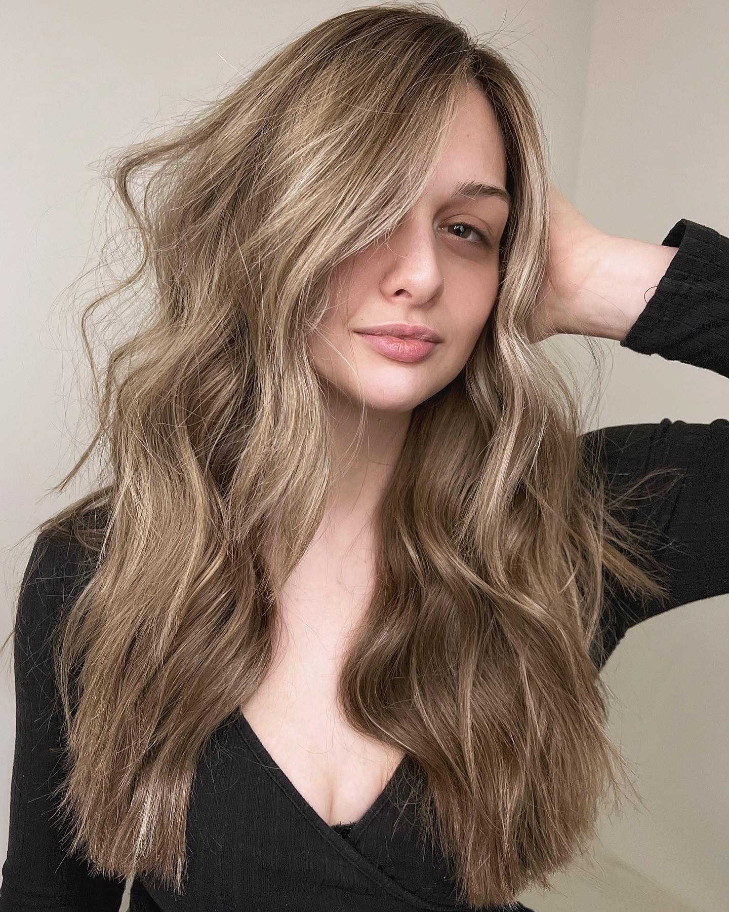 Undone Elegance: The Chic Tousle of Dark Blonde