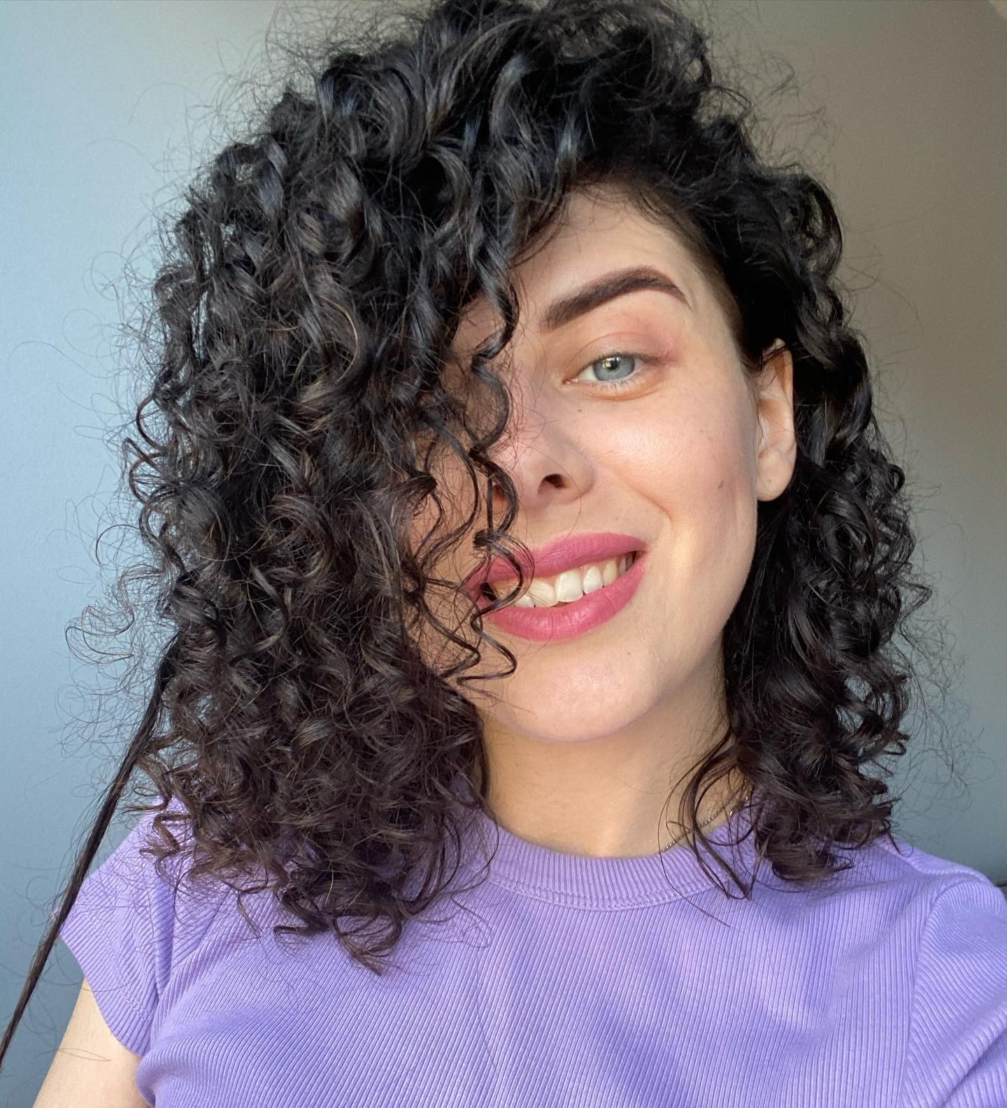 Asymmetrical Curly Bob