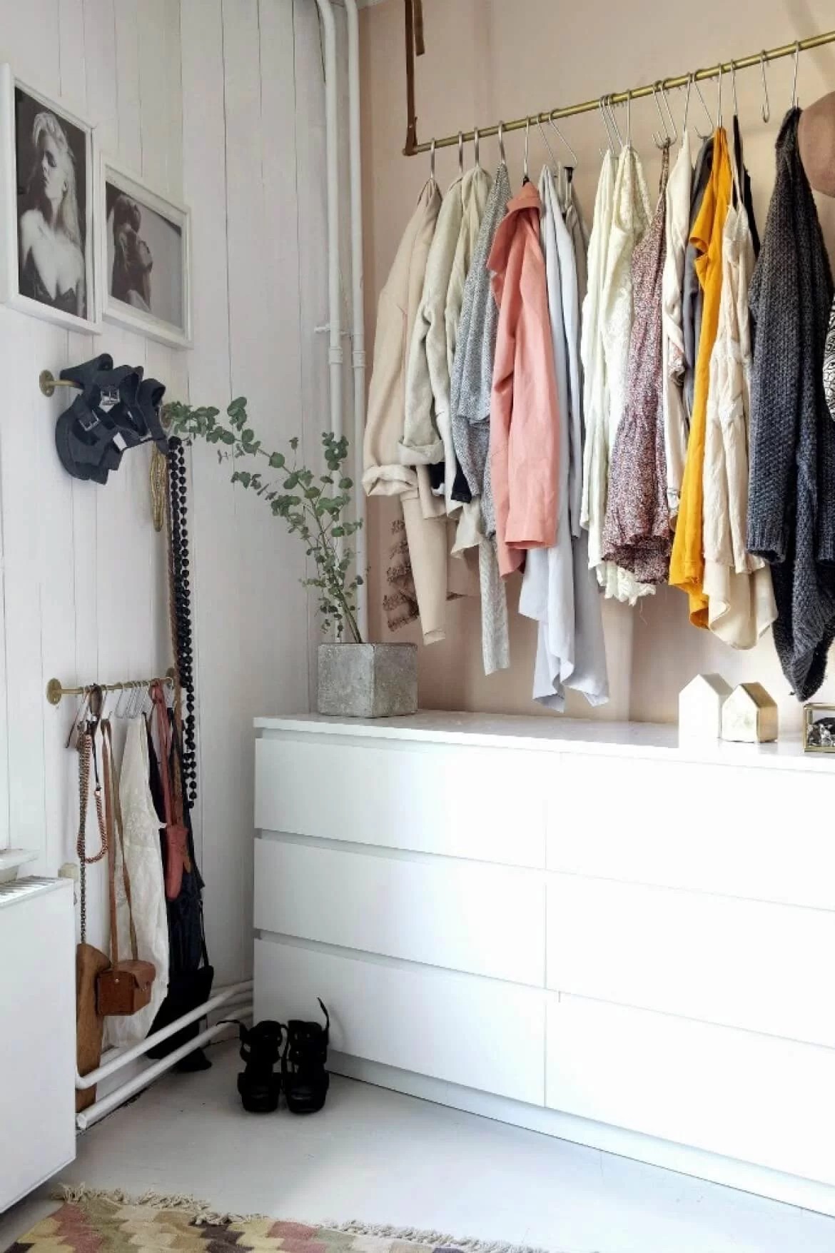 Gold Railing Above Dresser To Hang Clothing