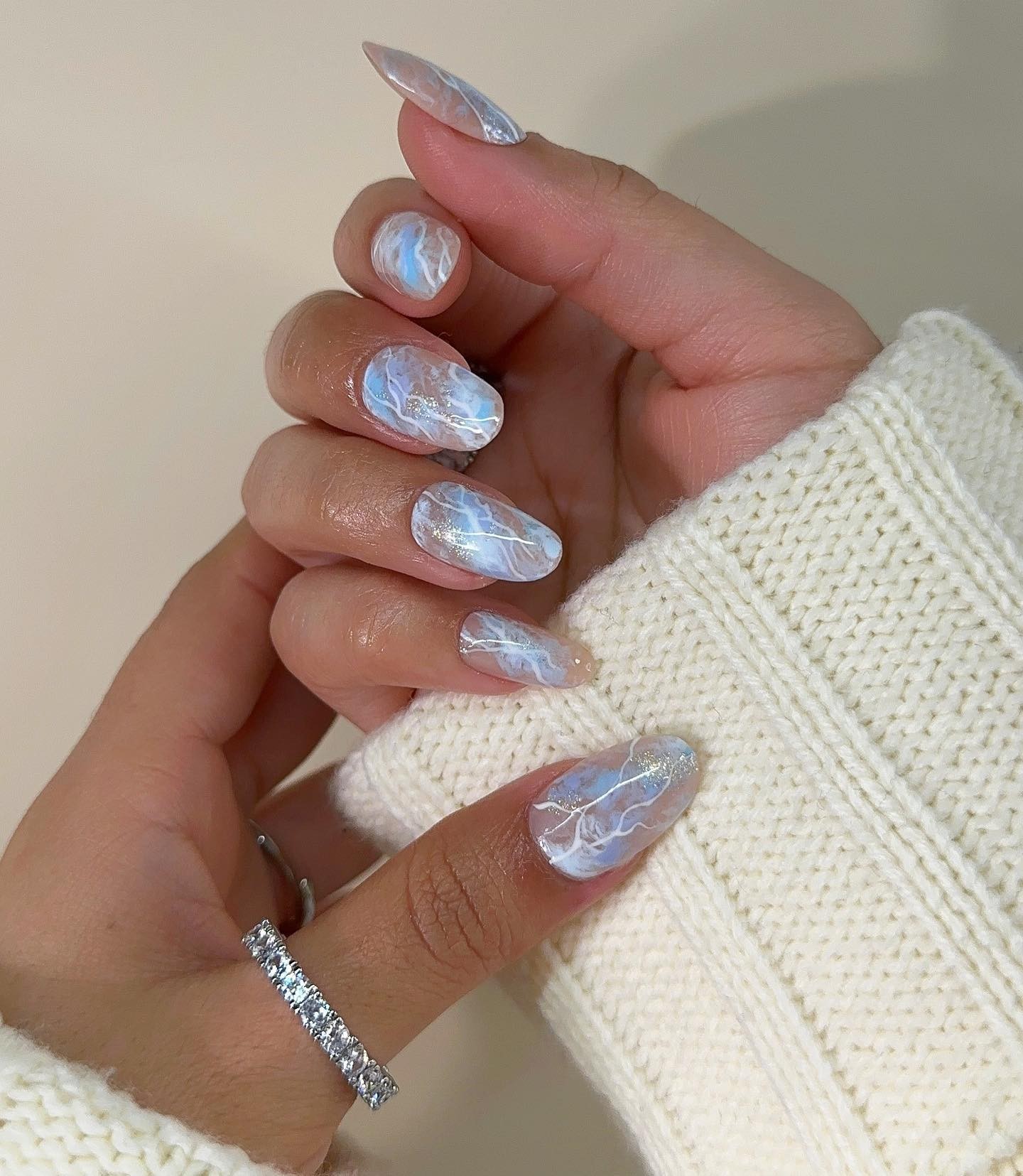 Soft White and Blue Marble Nails