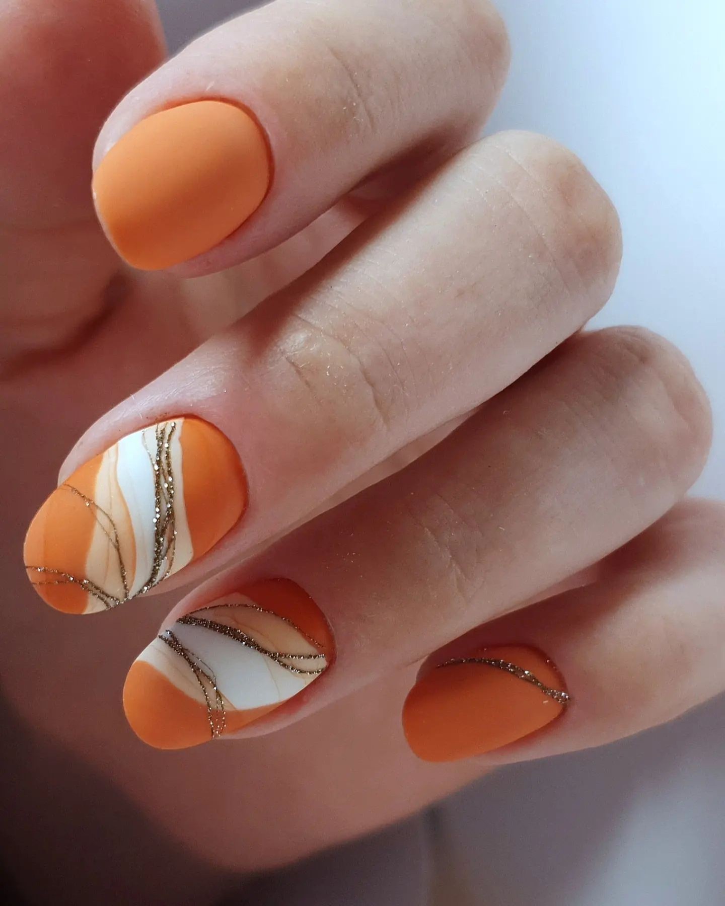 The Geometric Chic of Orange and White