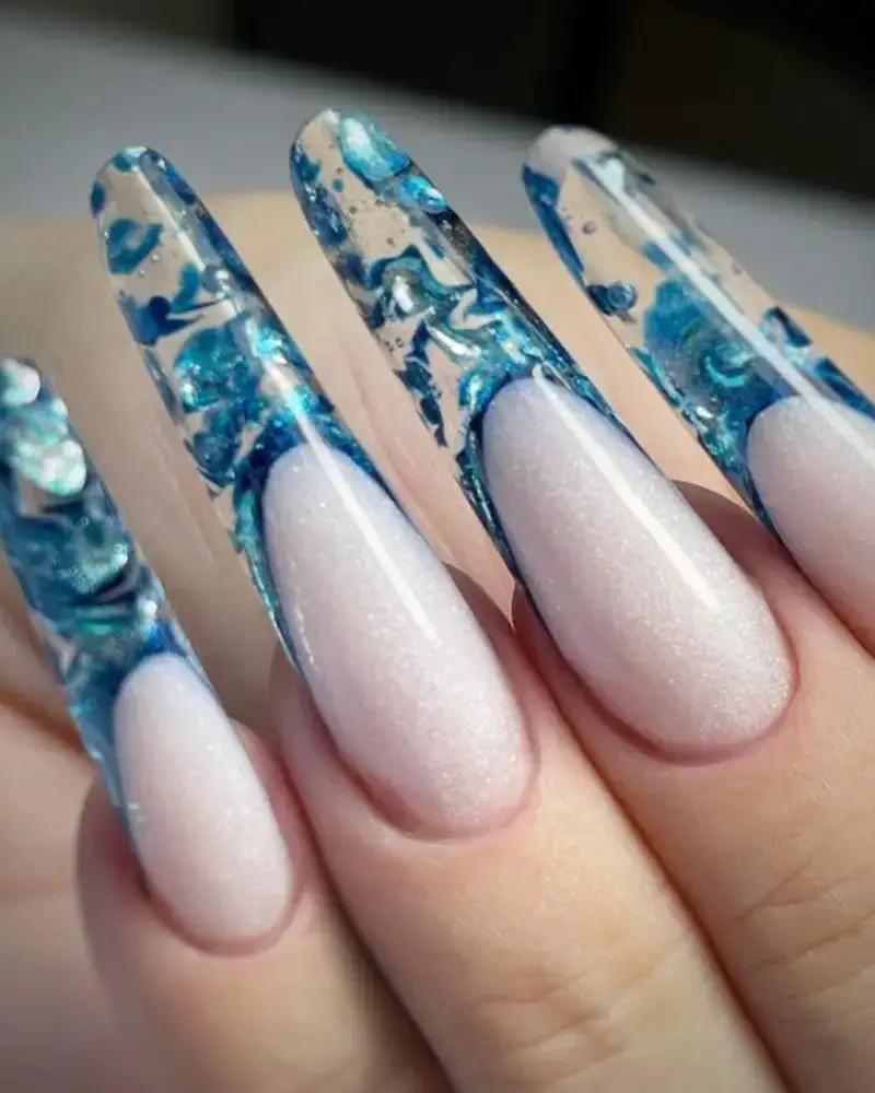 Icy Elegance: Winter’s Touch on Blue Tides