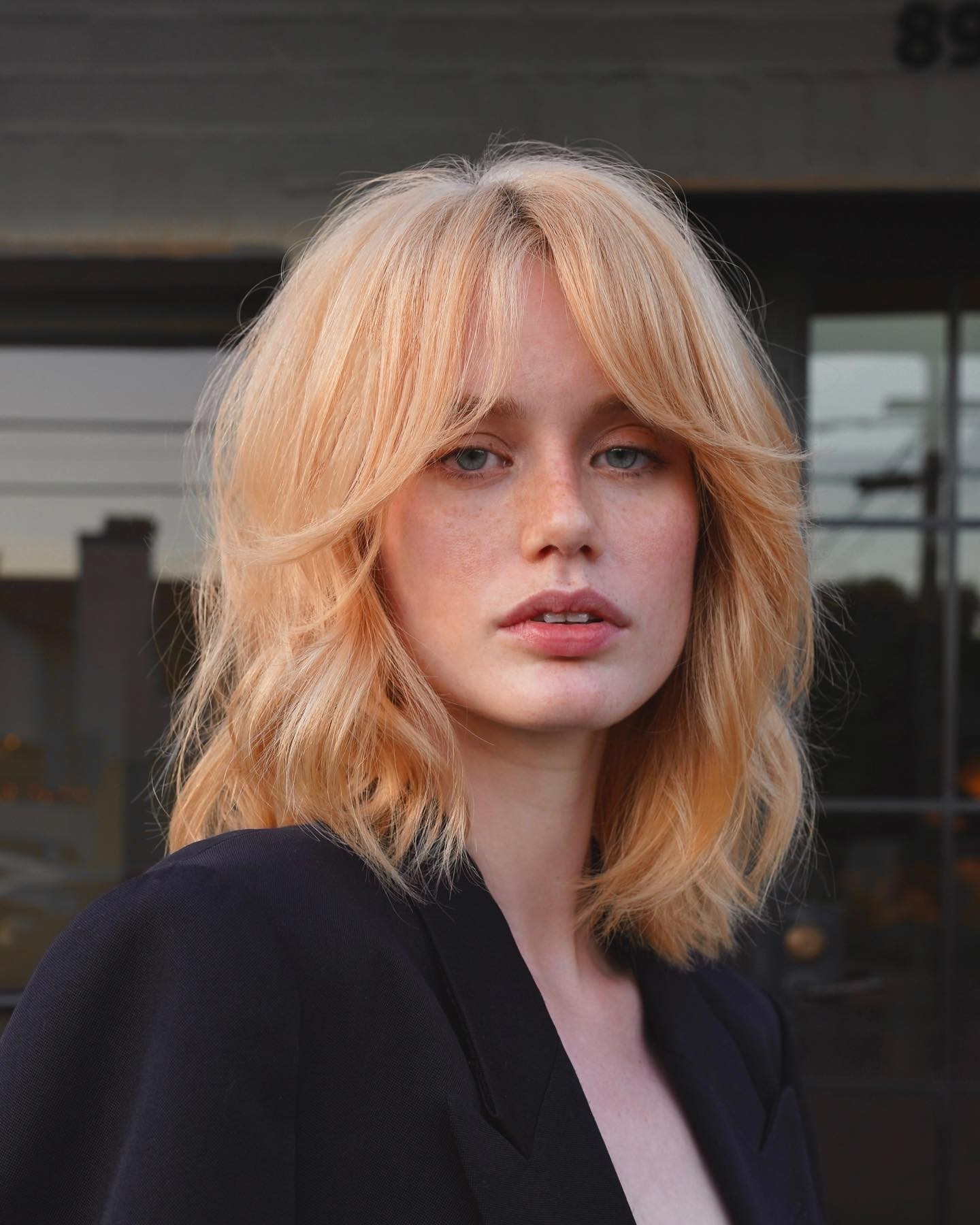 Sunset Hues with Soft Bangs