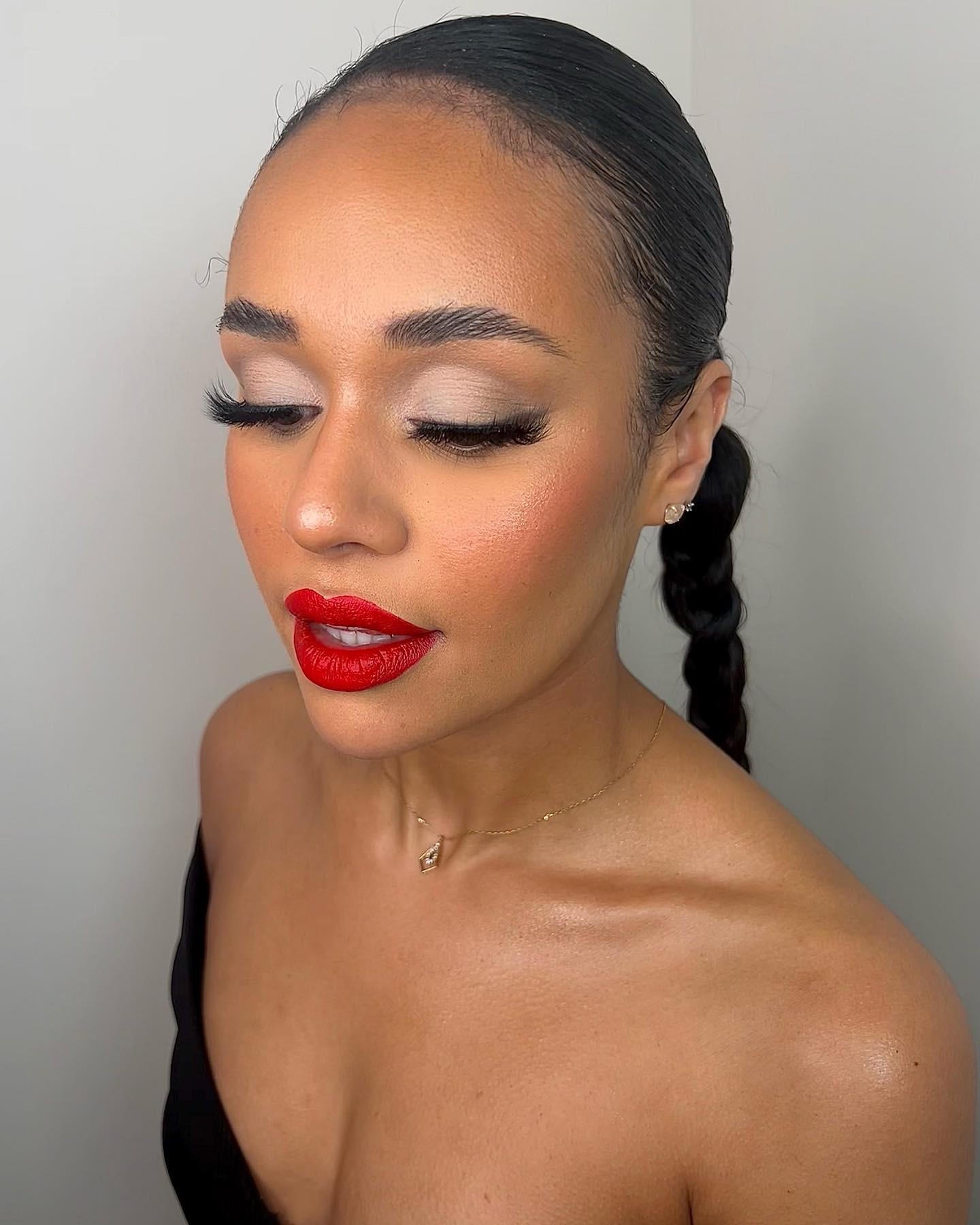 Sleek Braid with Bold Red Lips