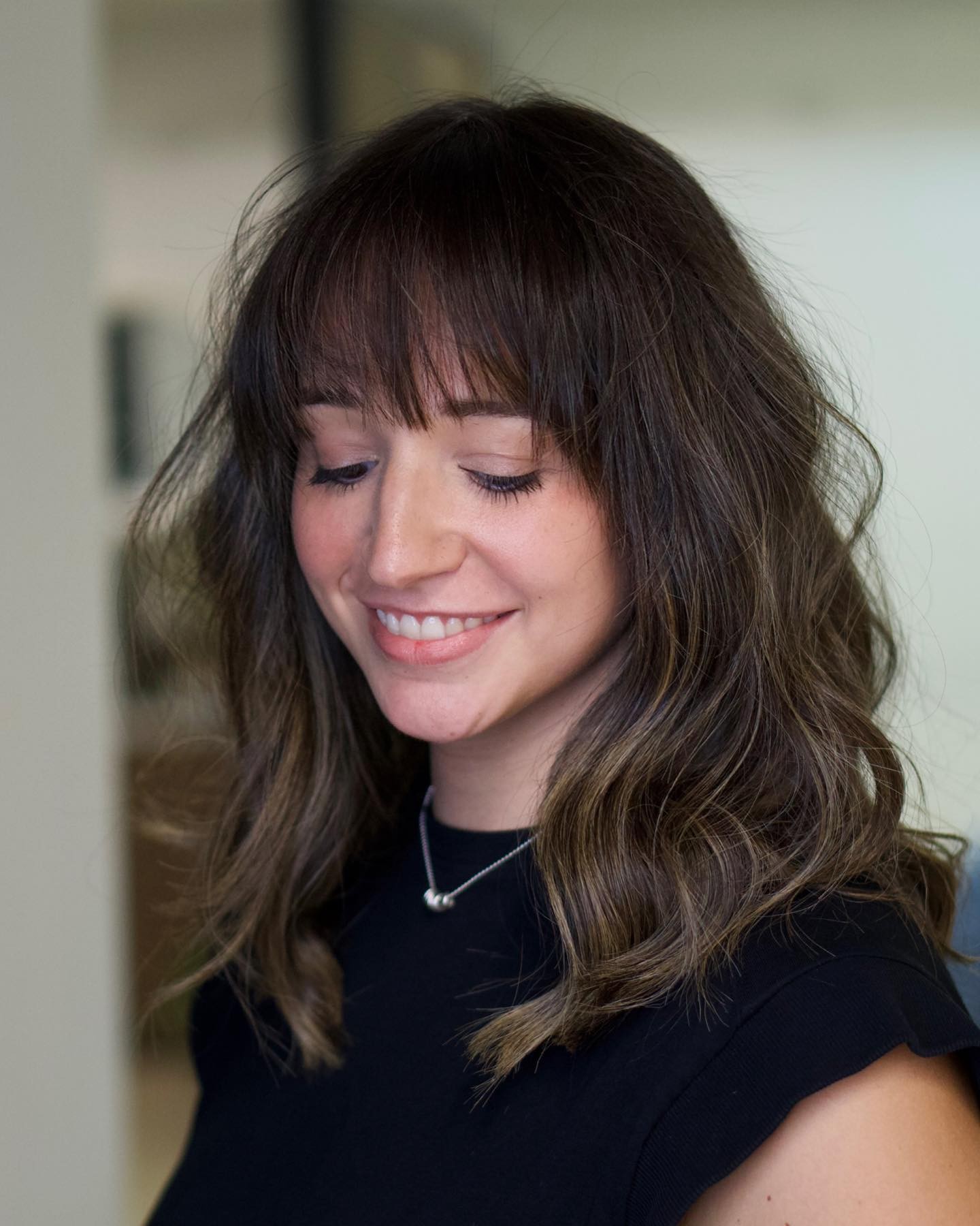 Lush Layers with Voluminous Bangs