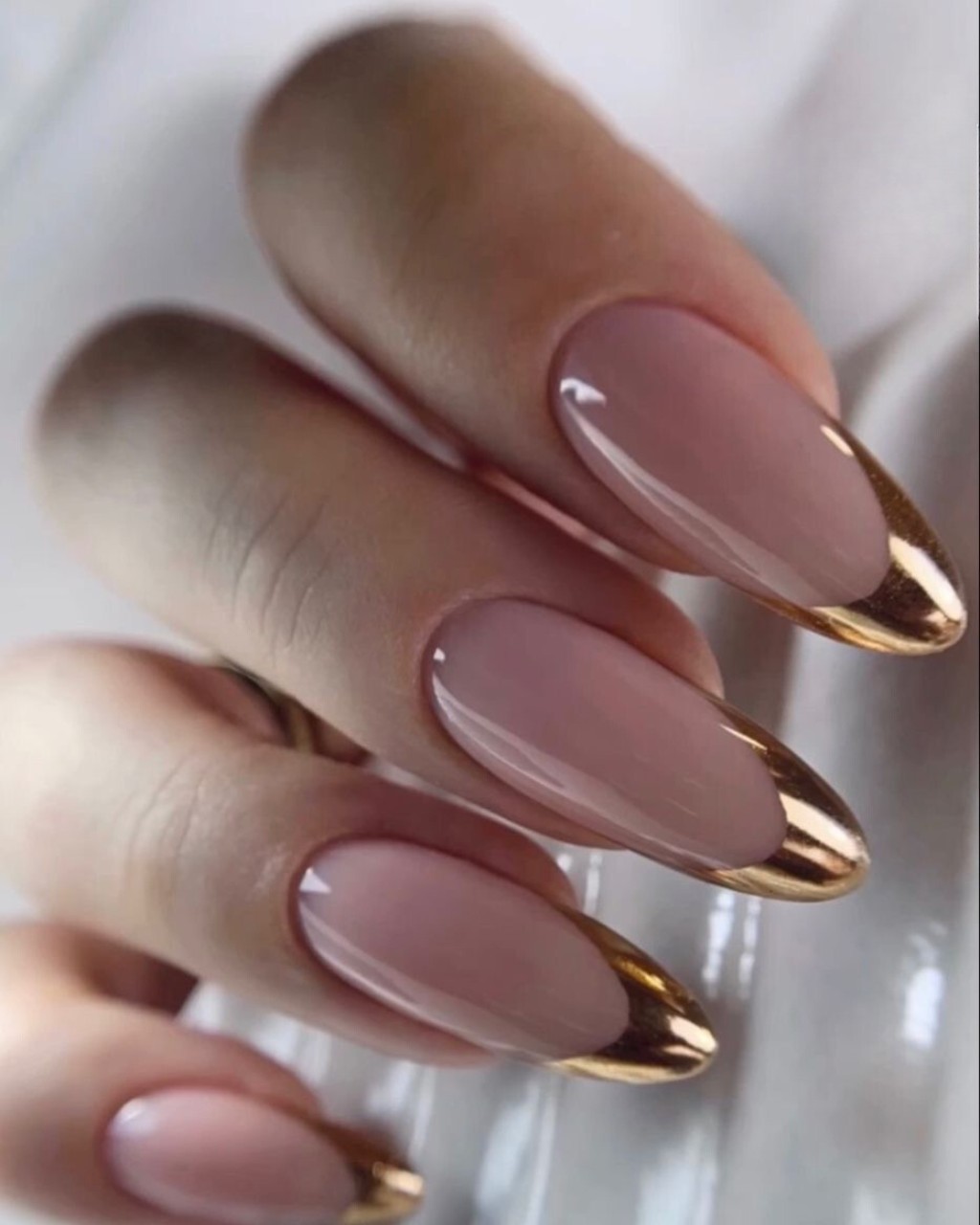 Elegant Edges: The Sharp Contrast of Gold and Nude