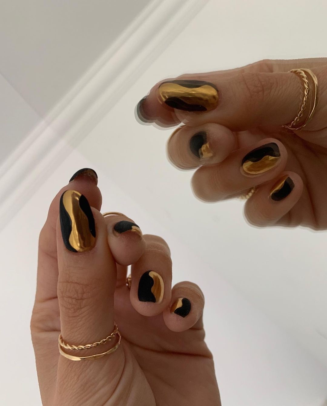 Abstract Artistry: Bold Patterns in Black and Gold