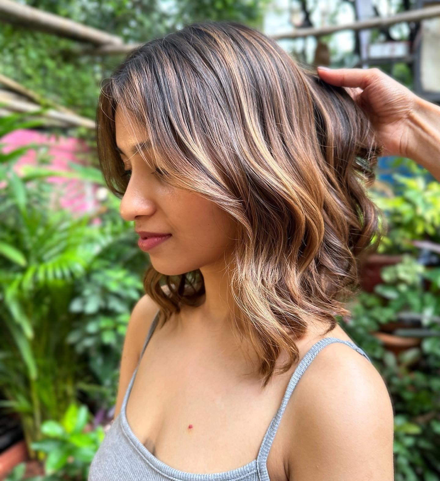 Embracing Elegance with a Side-swept Wavy Bob