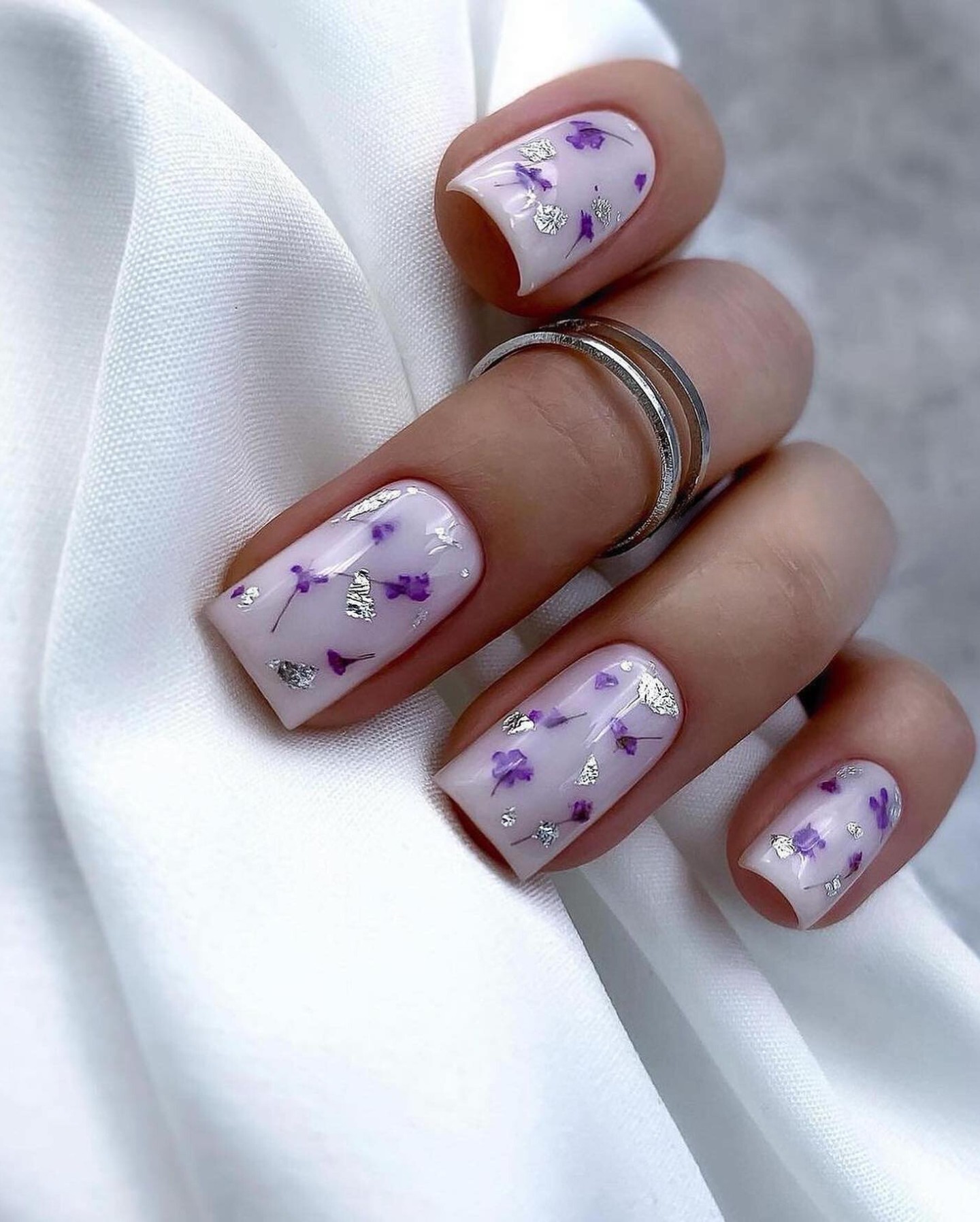 Delicate Purple Flower Nail Art on Short Nails