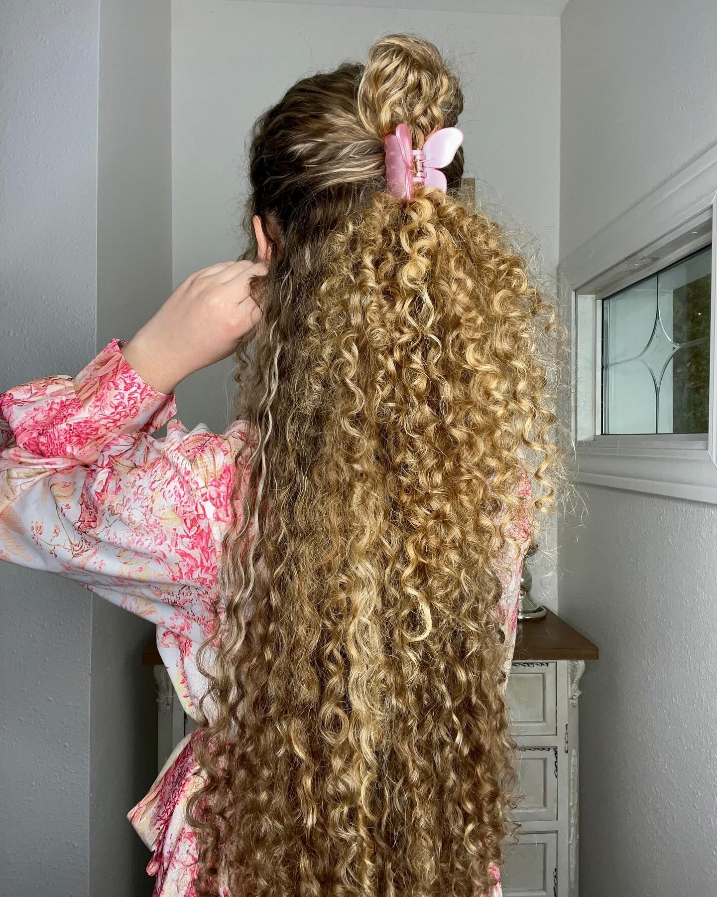 Long Curly Ponytail with Butterfly Clip