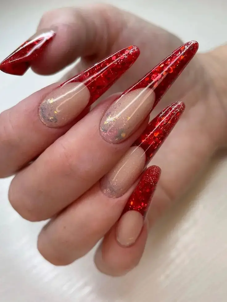 The Glitterati’s Choice: Red Sparkle on Almond Nails