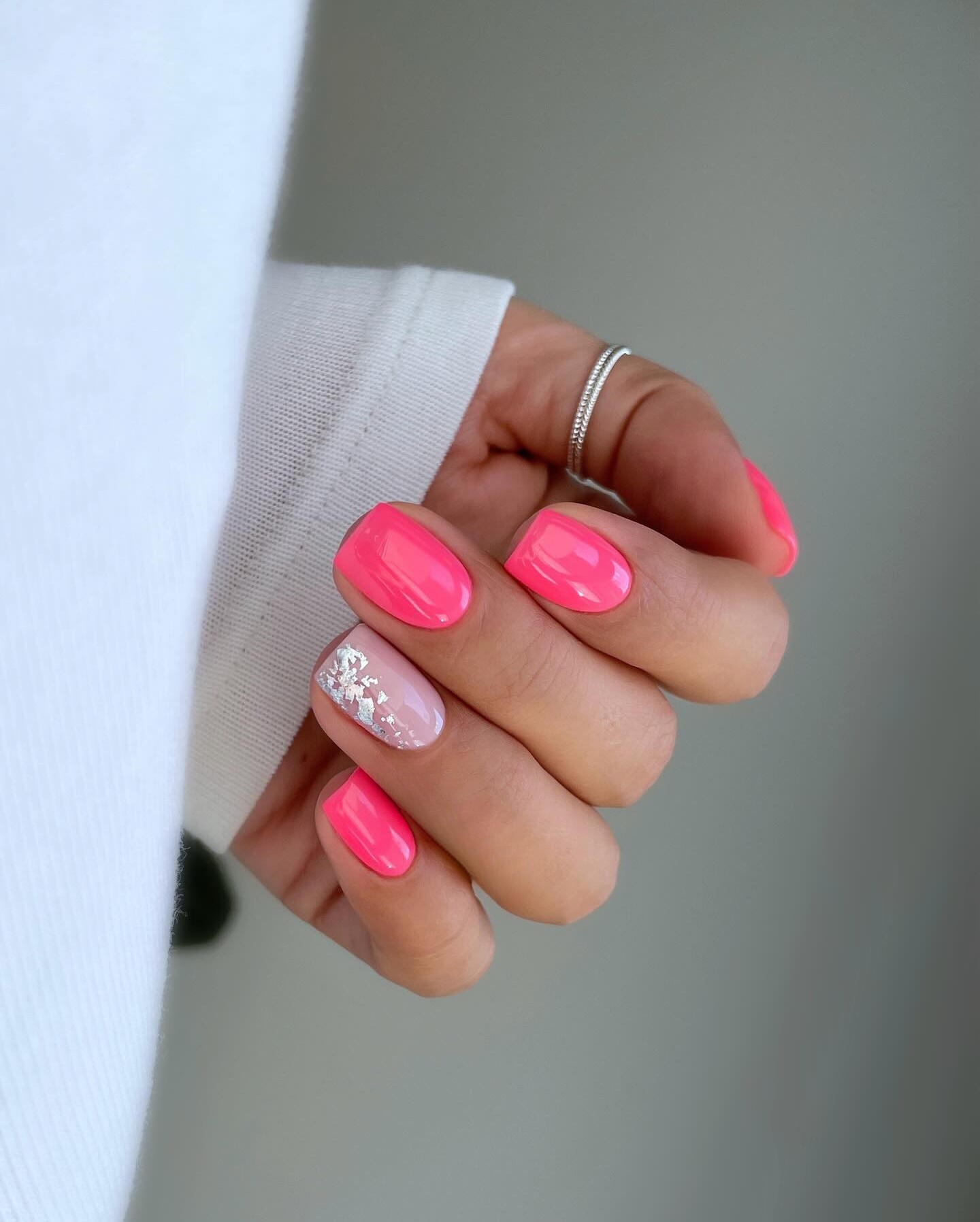 Neon Pink Nails with Silver Glitter Accent