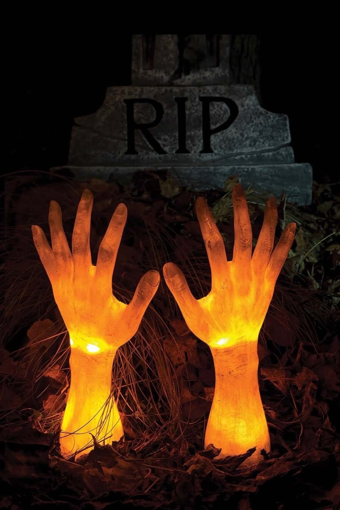 Glowing Corpse Hands Reaching for Freedom