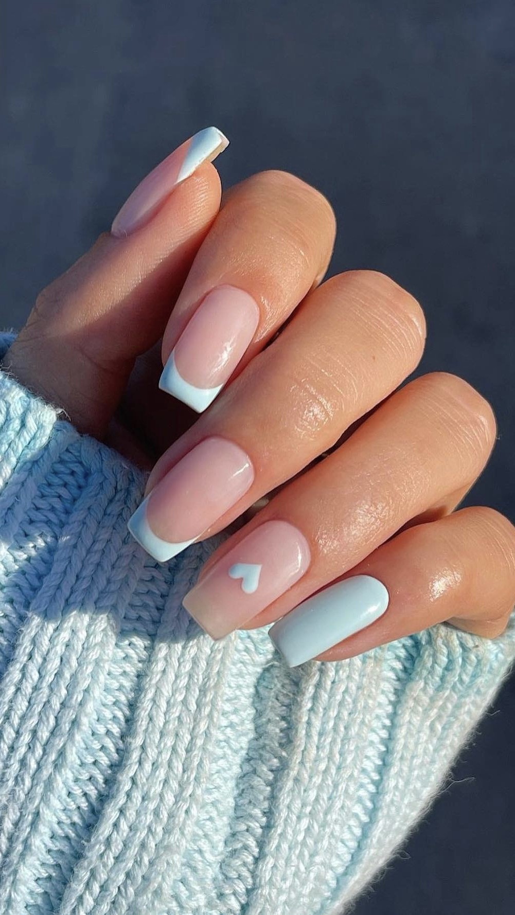 Classic French Manicure with a Soft Blue Accent