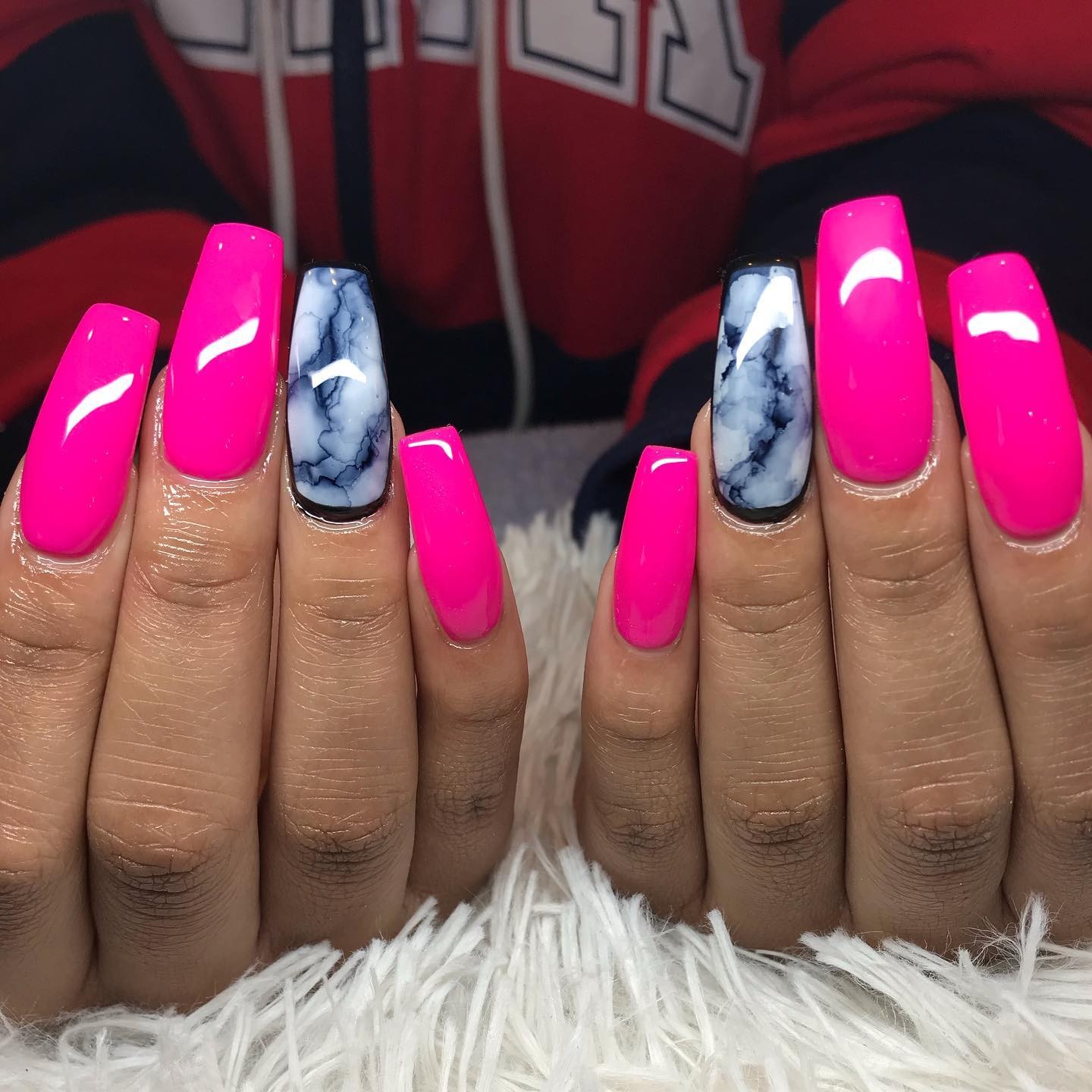 Vibrant Pink and Black Marble Nails