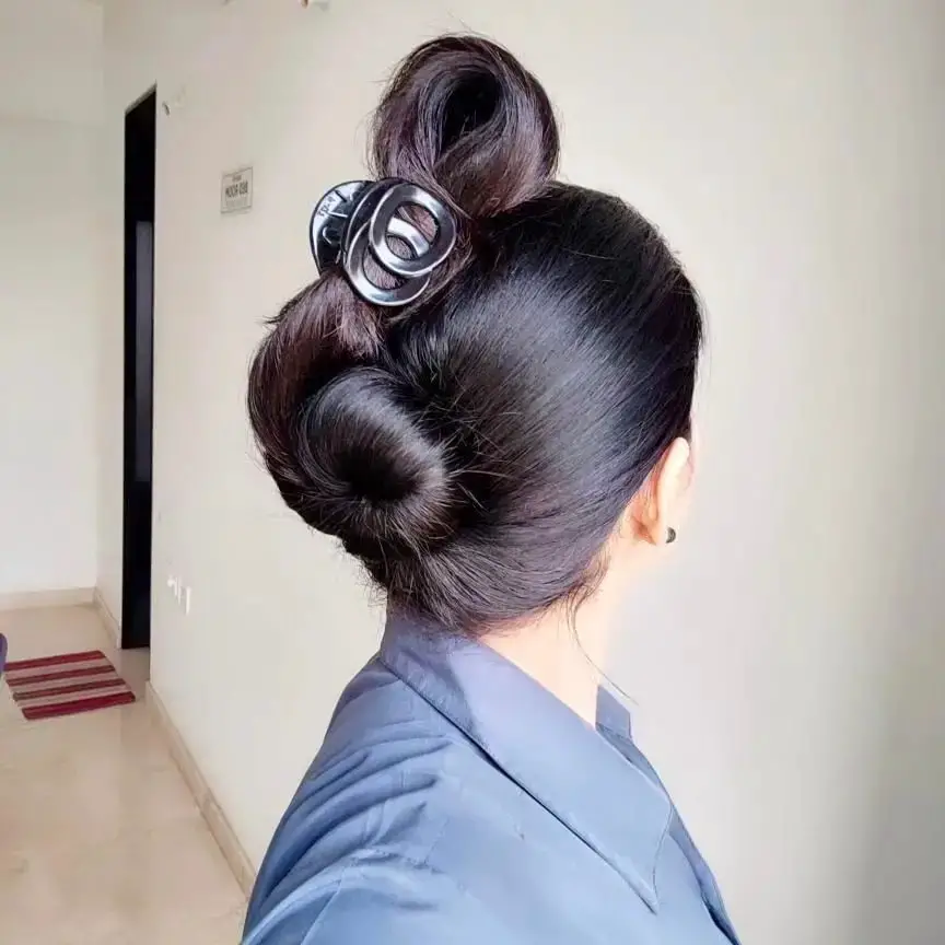 Sleek Double Bun with Clip