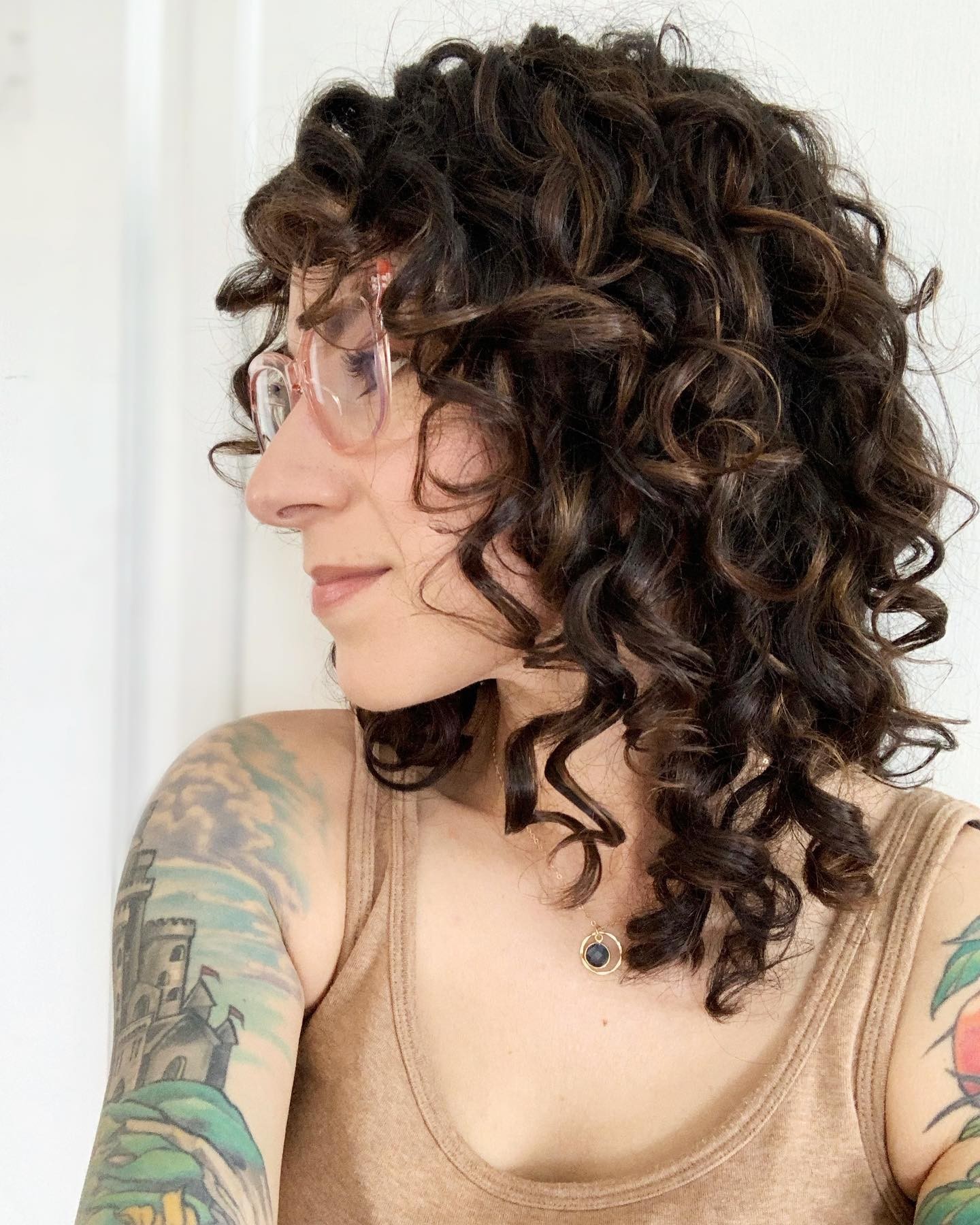 The Sophisticated Curls With Glasses