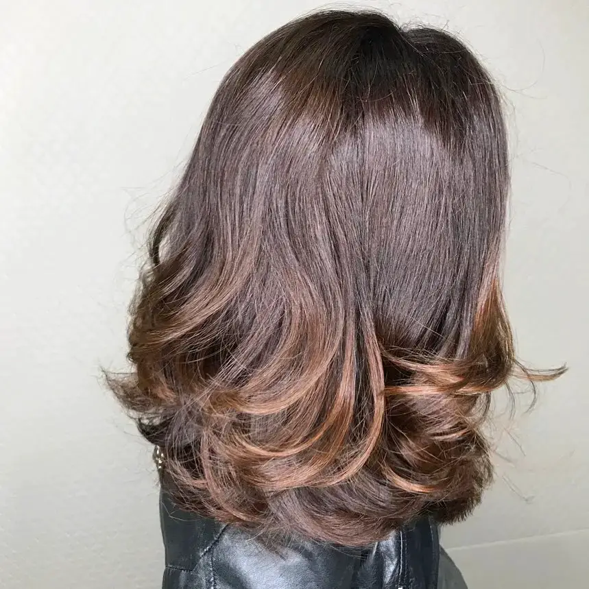 Soft Waves with Auburn Highlights