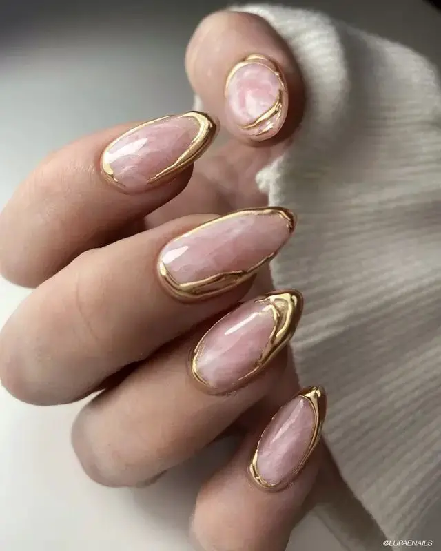 Pink Marble Nails with Gold Accents