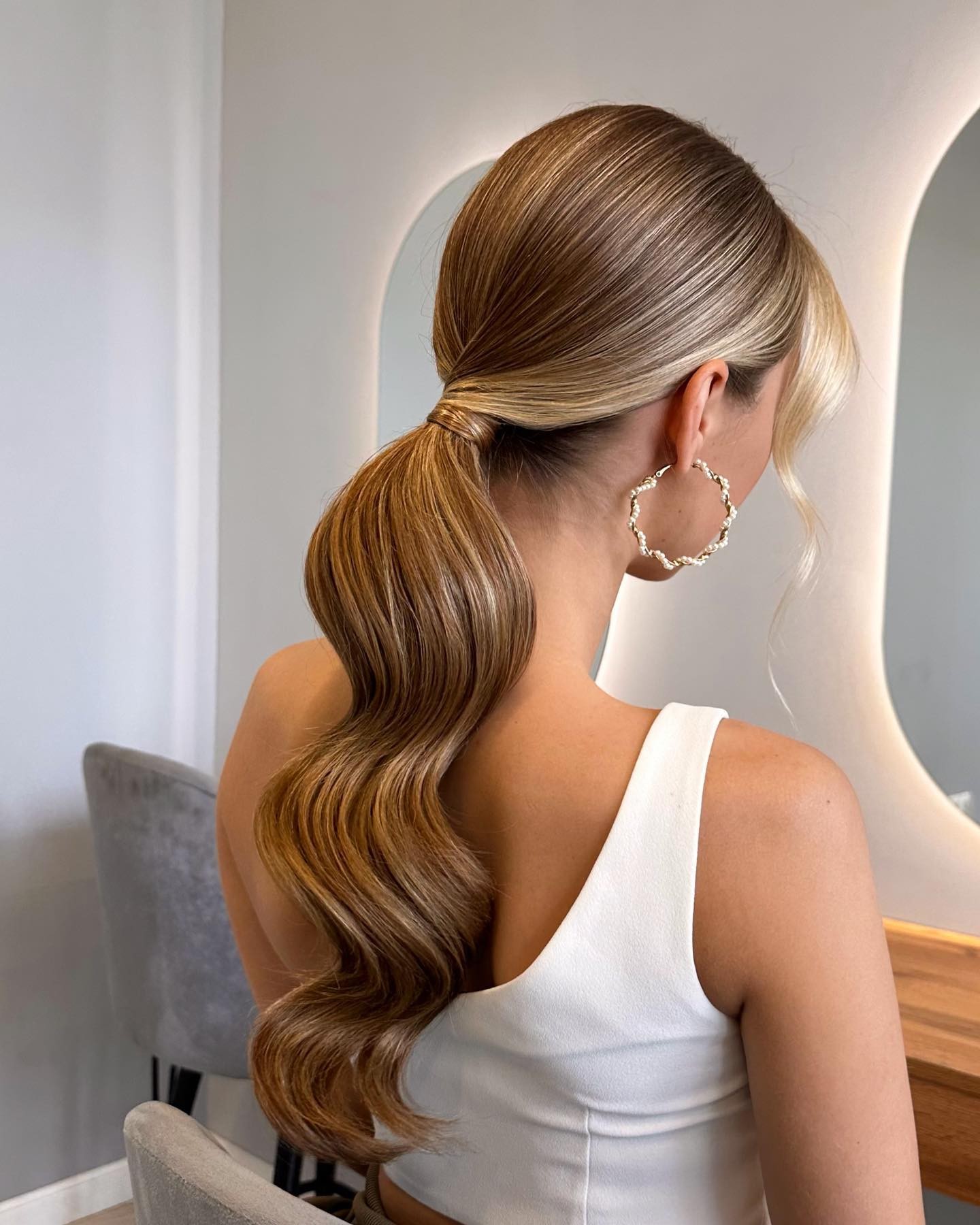 The Sleek Cascade Ponytail