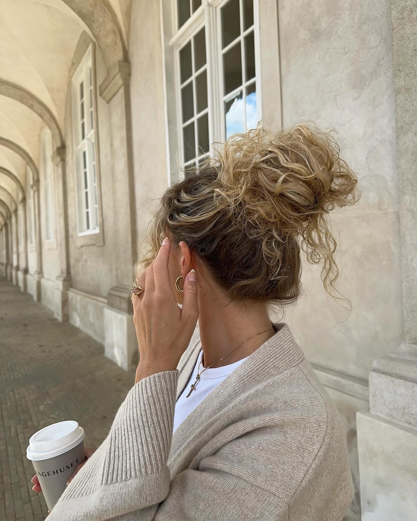 Architectural Updo with Curly Contrasts