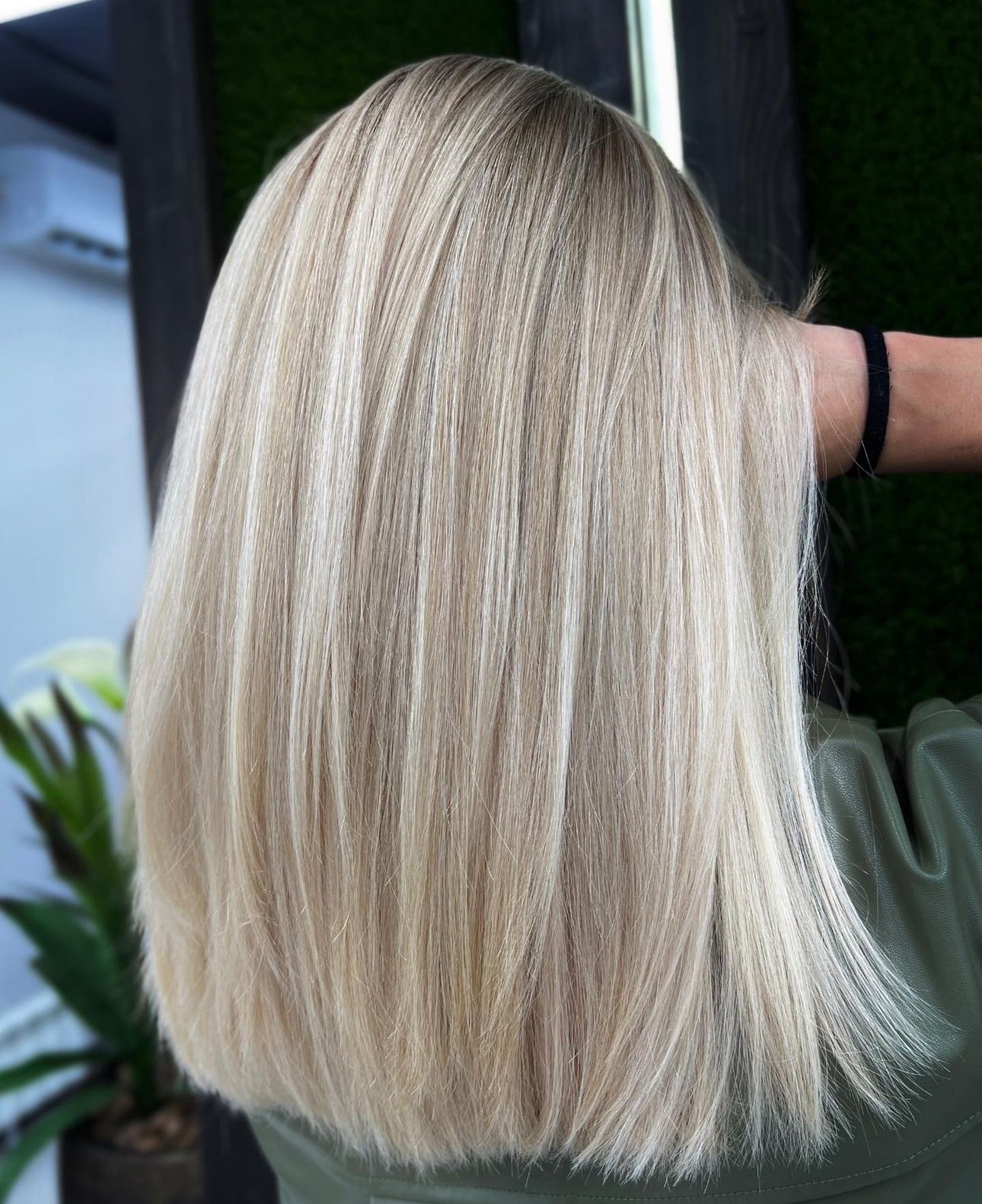 Sleek Blonde Bob with Low Lights