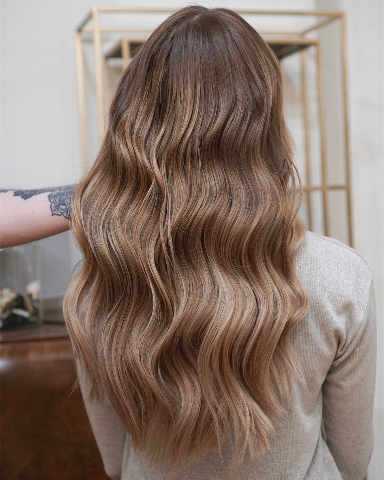 Golden Elegance: Balayage on Dark Blonde