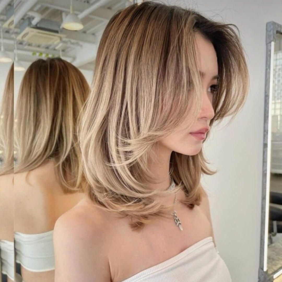 The Modern Muse: A Medium Layered Bob