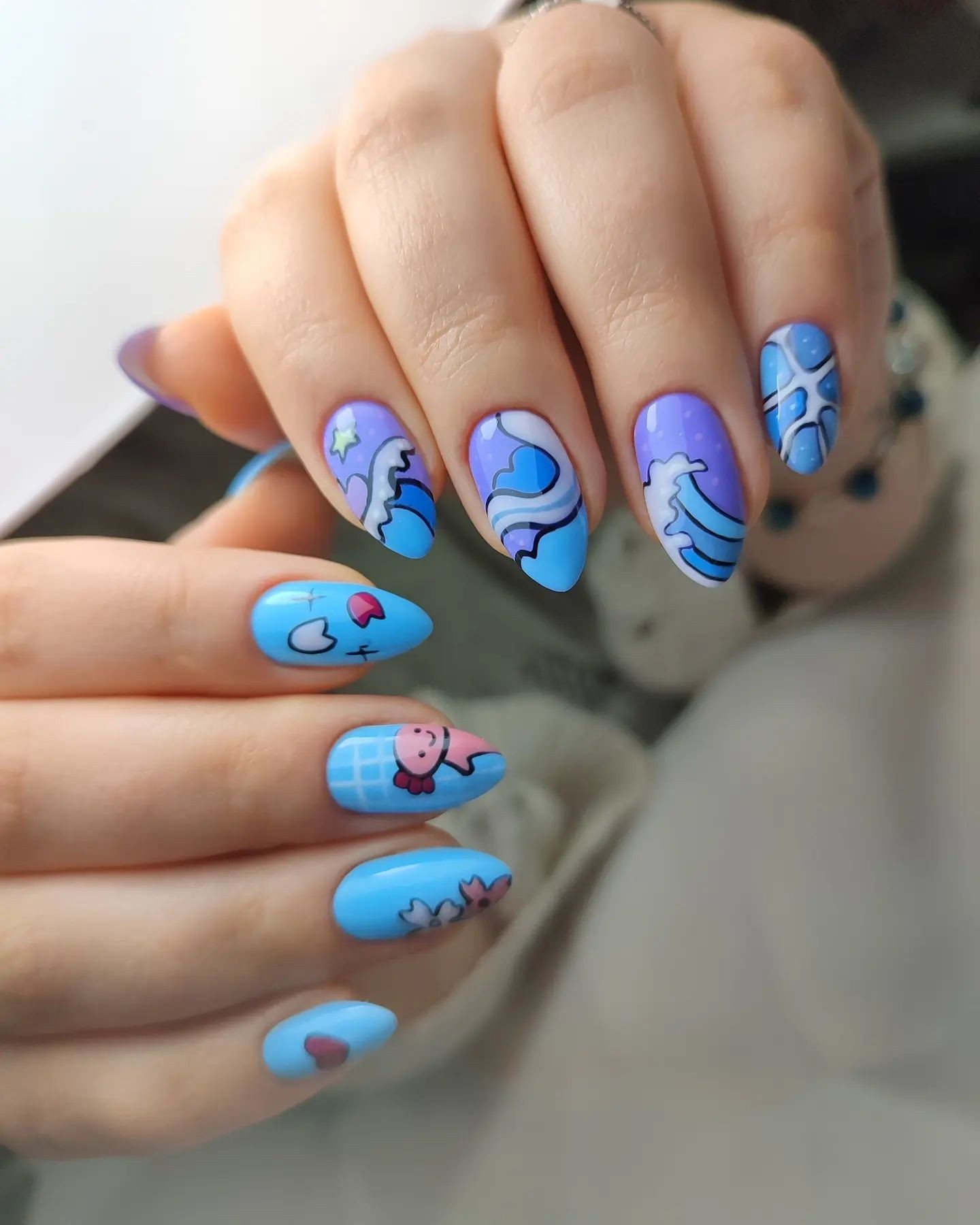 Whimsical Blue Cartoon Nails