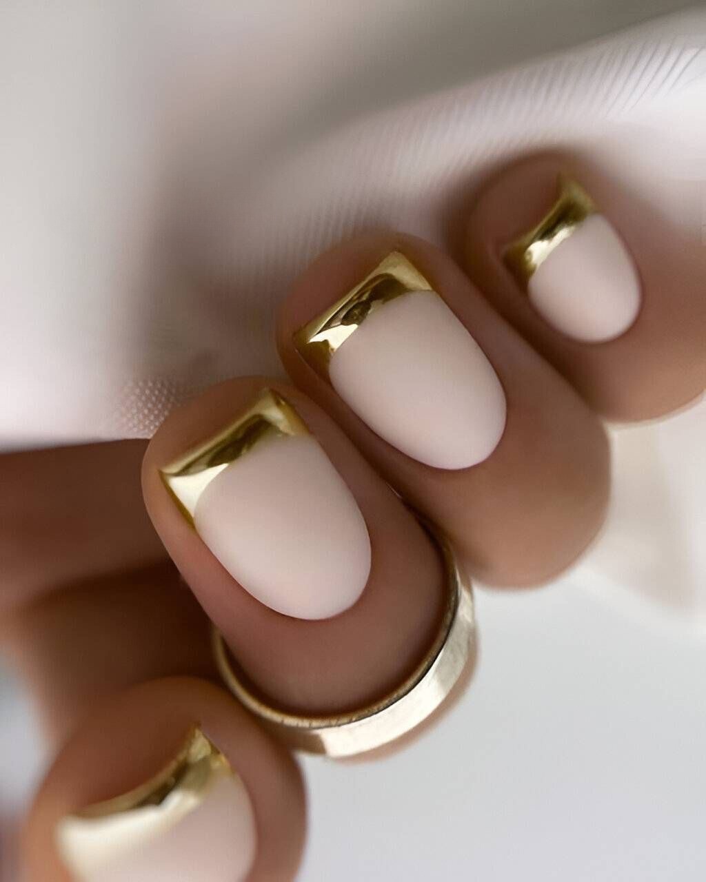 Minimalist Matte and Gloss: Dual Textures in Gold