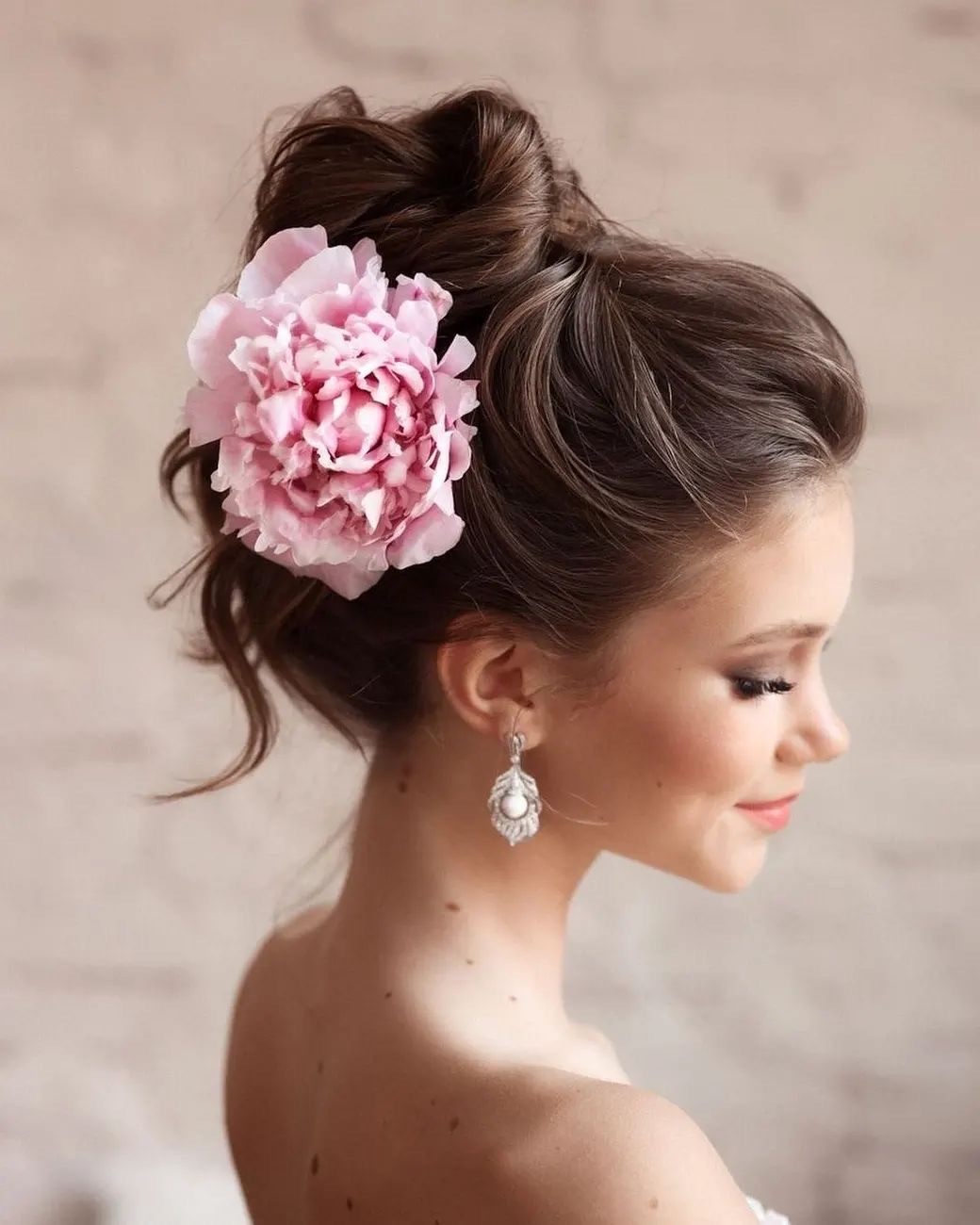 The Casual Side Bun with a Floral Accent