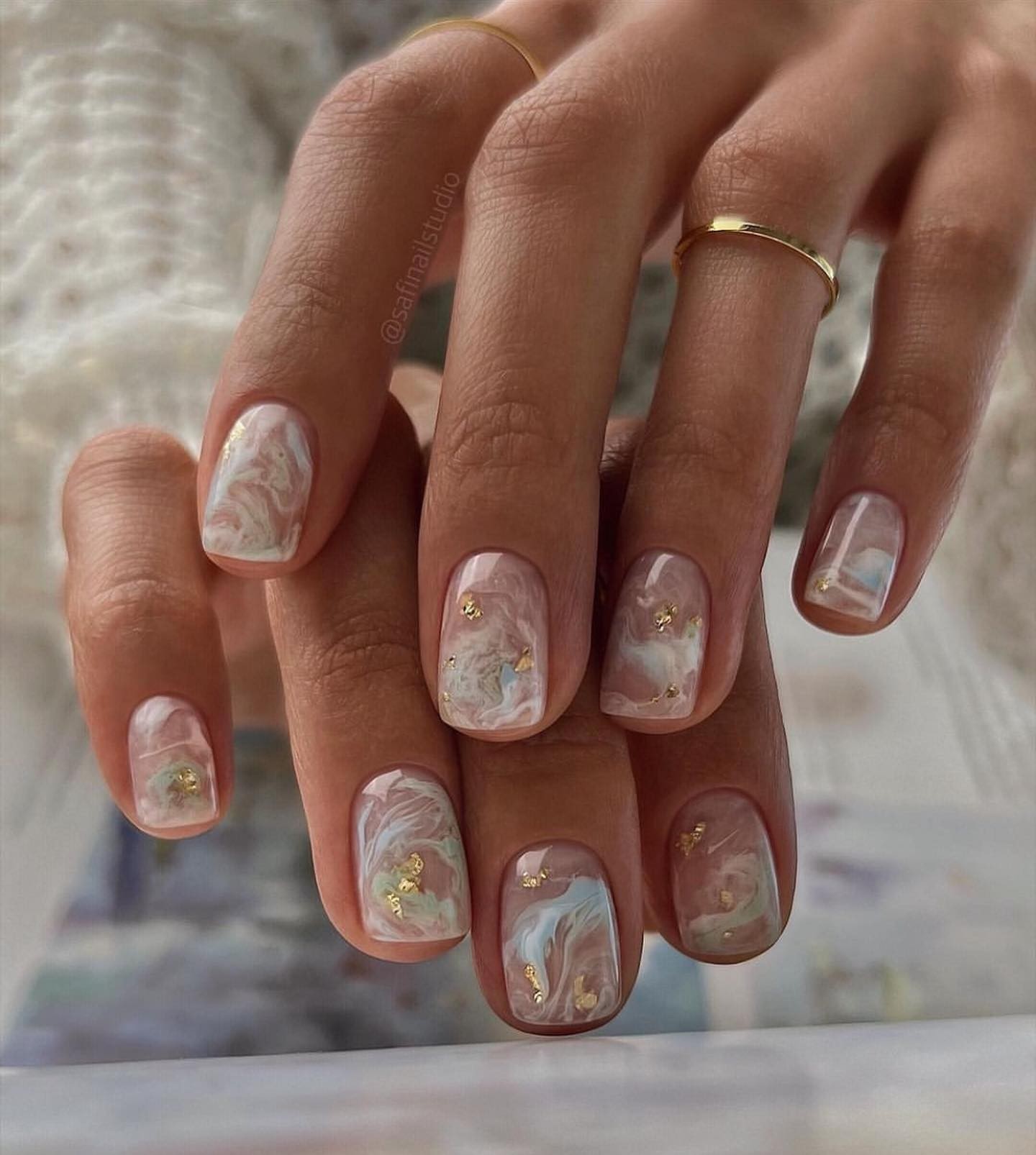 Neutral Marble Nails with Gold Accents