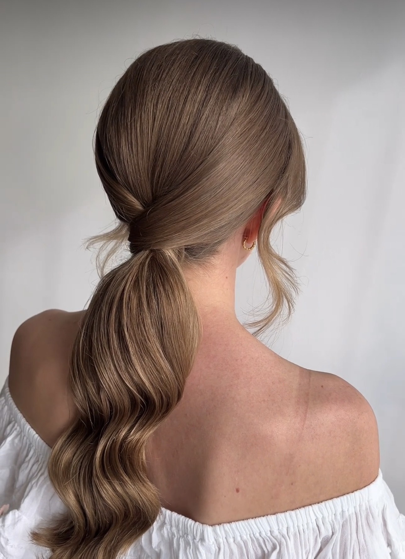 Effortless Low Ponytail with Soft Waves