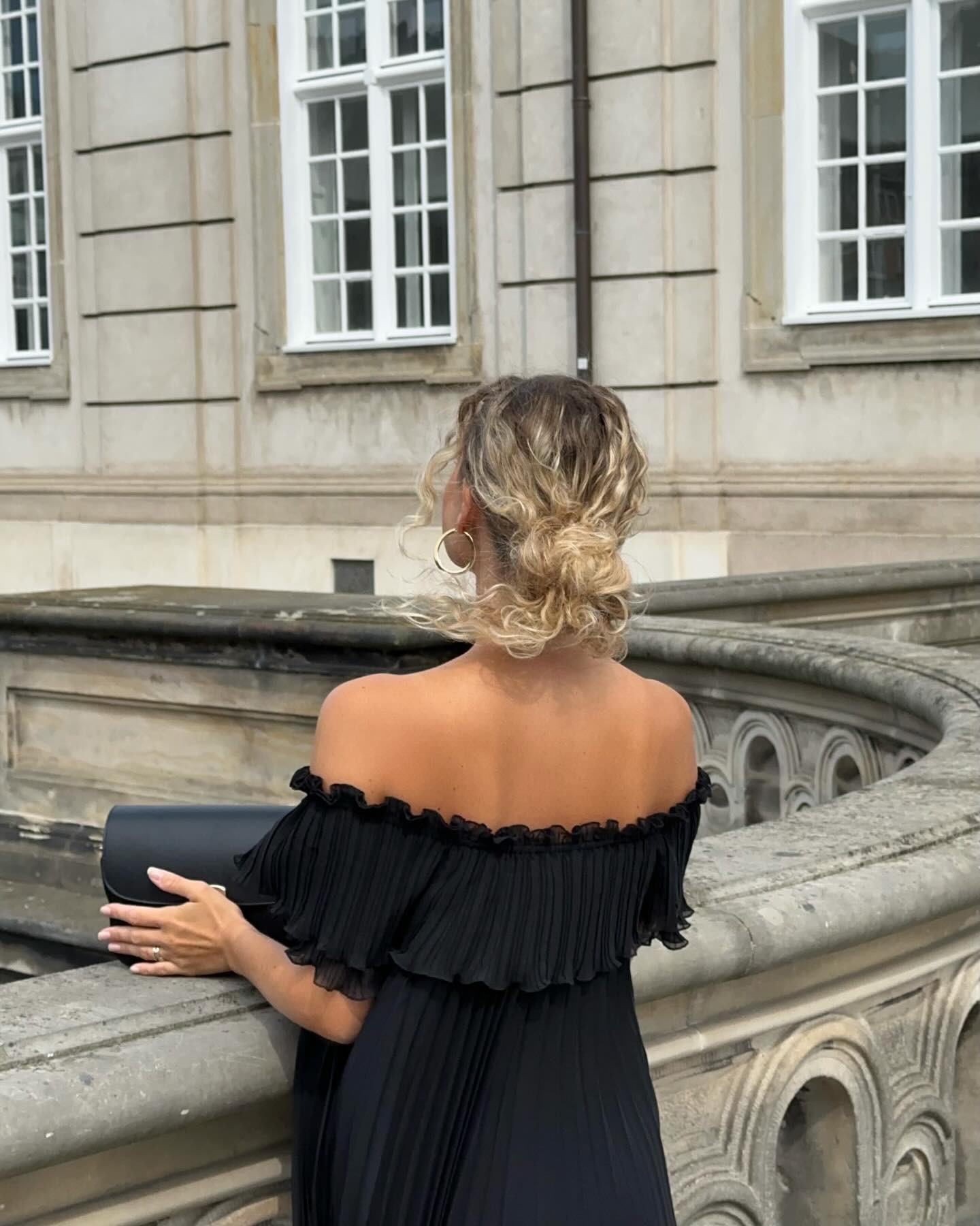 Regal Updo with a Playful Twist