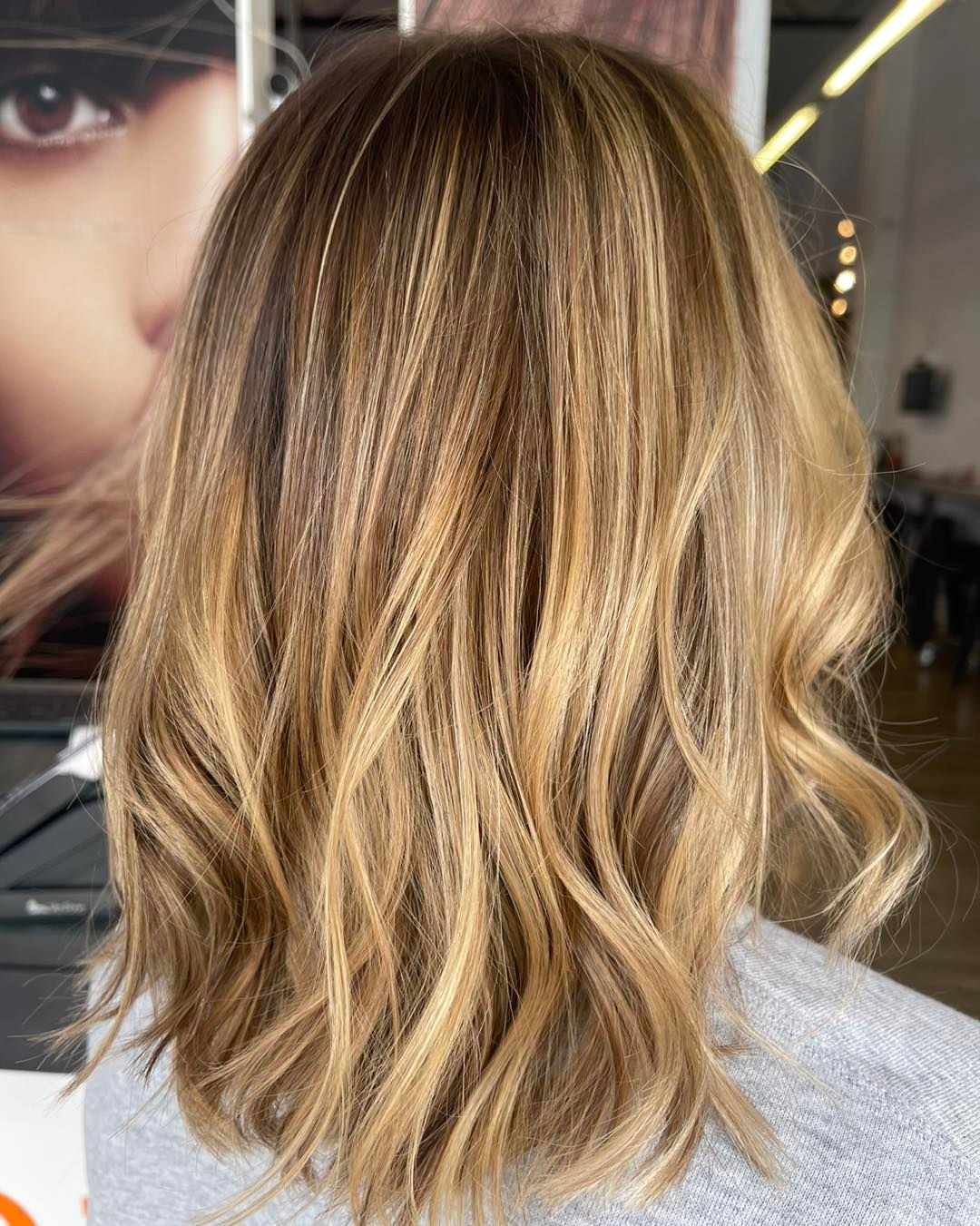 Soft Honey Balayage for the Fashion-Forward