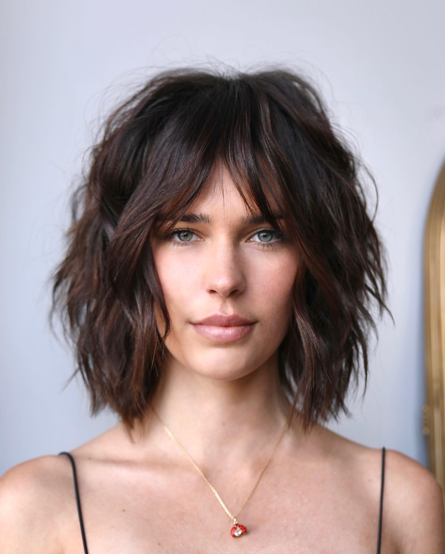 Shaggy Brunette Waves with Bangs