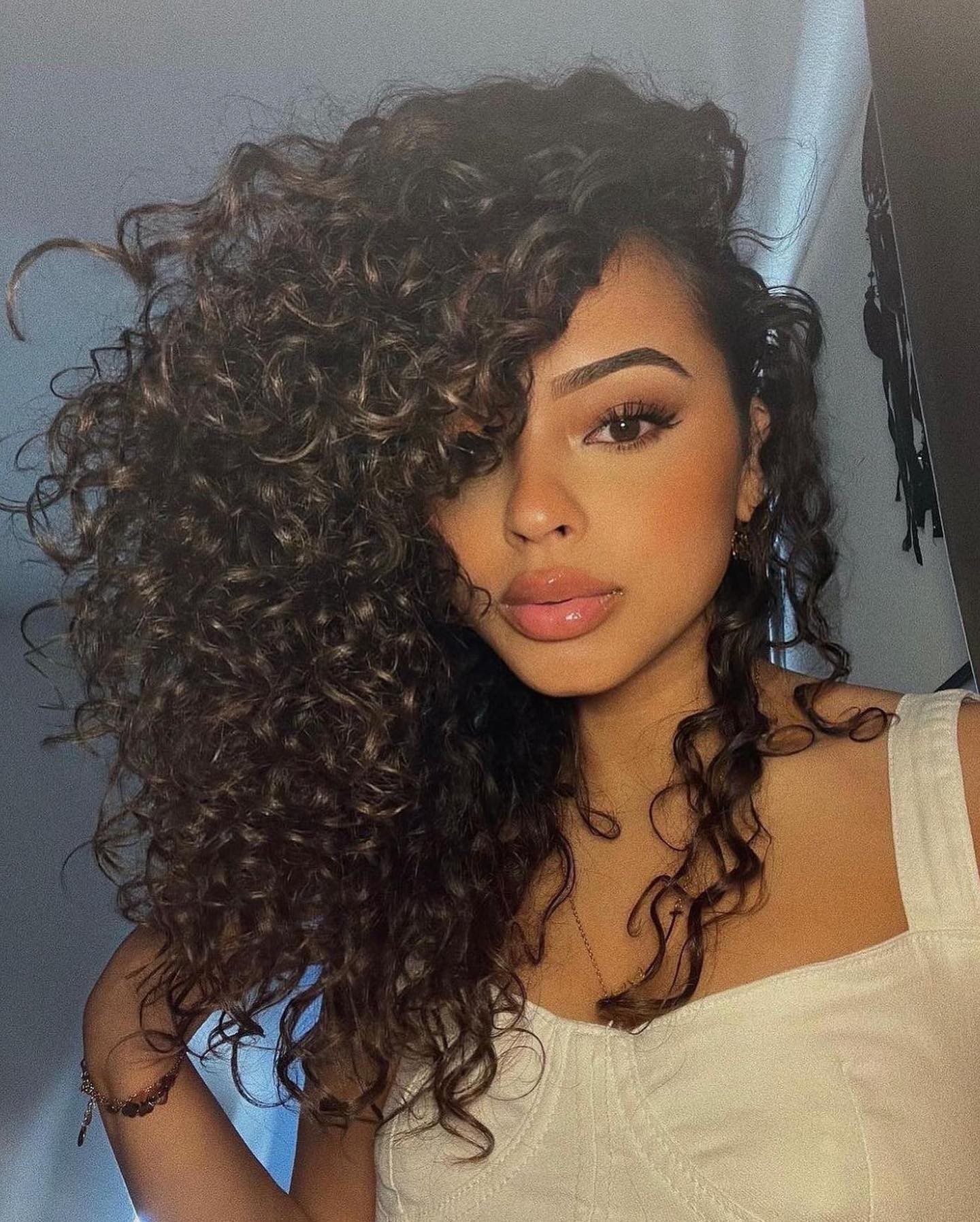 Lush Voluminous Side-Swept Curls