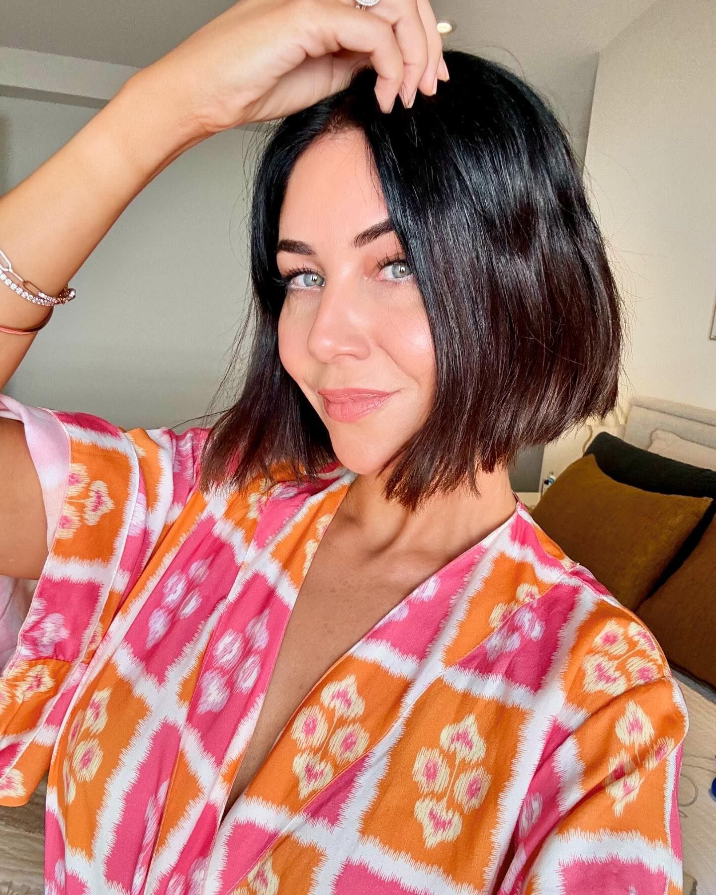 Vibrant Brunette Bob with a Pop of Color