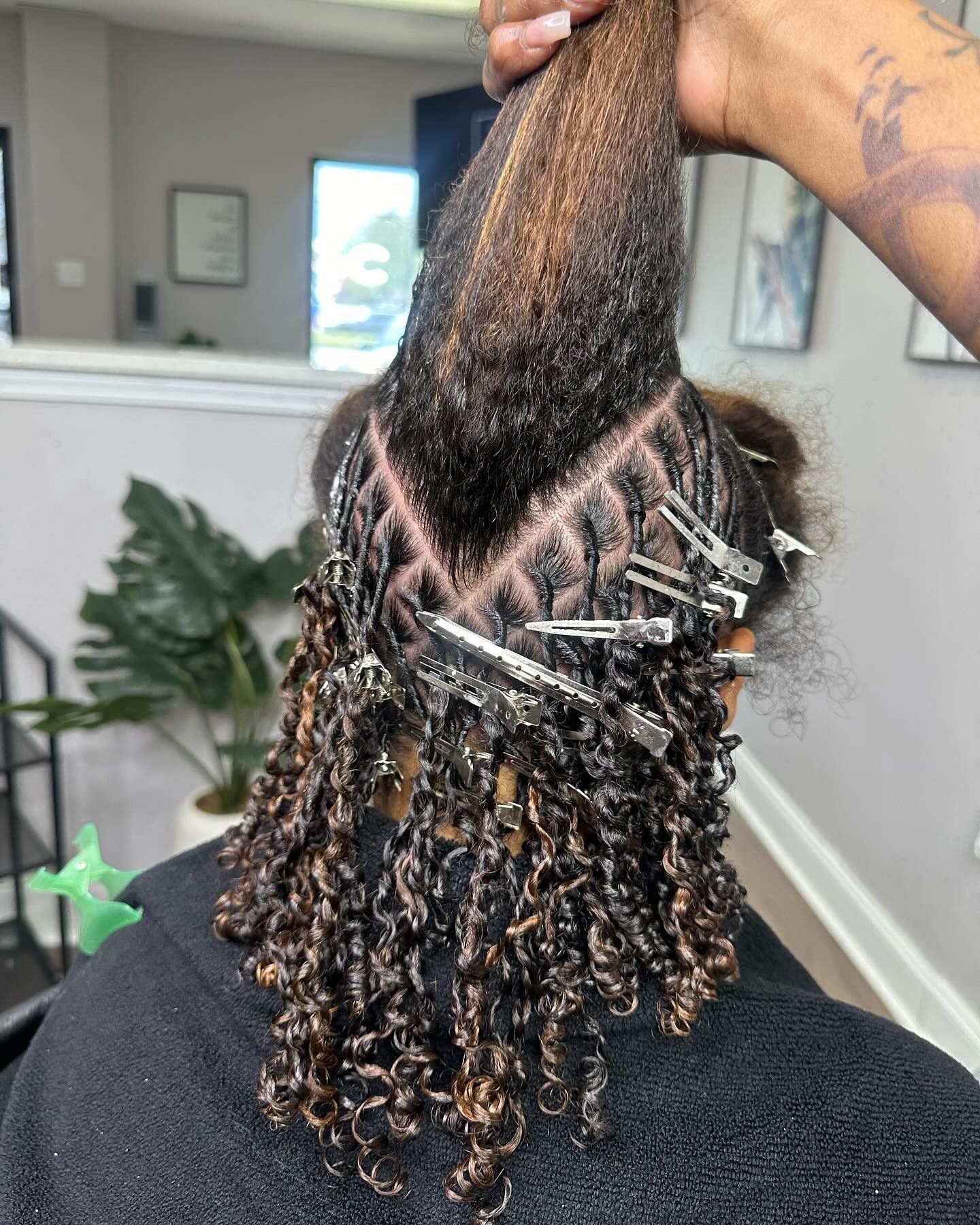 The Elegance of Locs in the Styling Chair