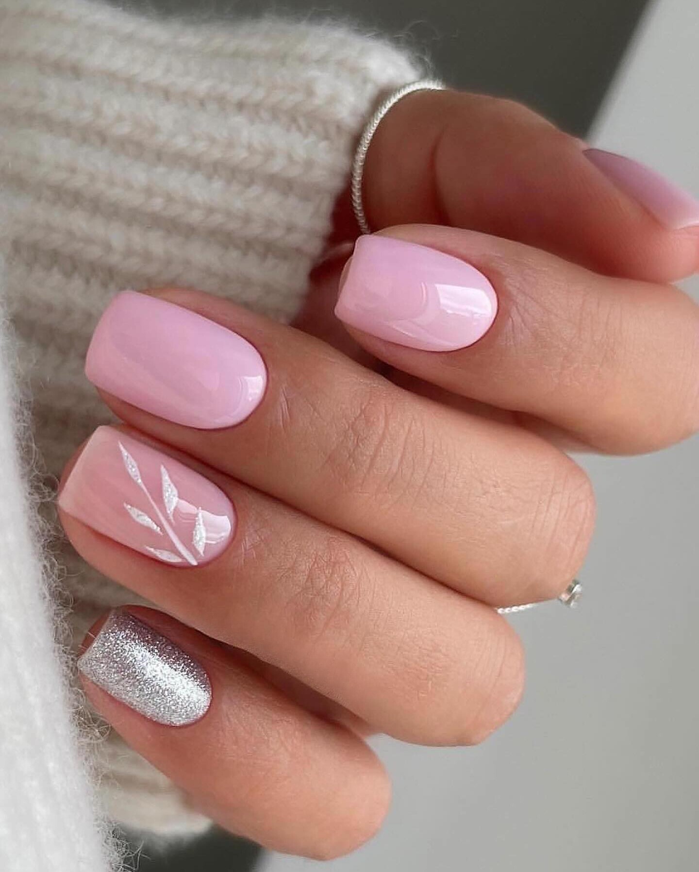 Soft Pink Nails with Silver Glitter and Leaf Accent