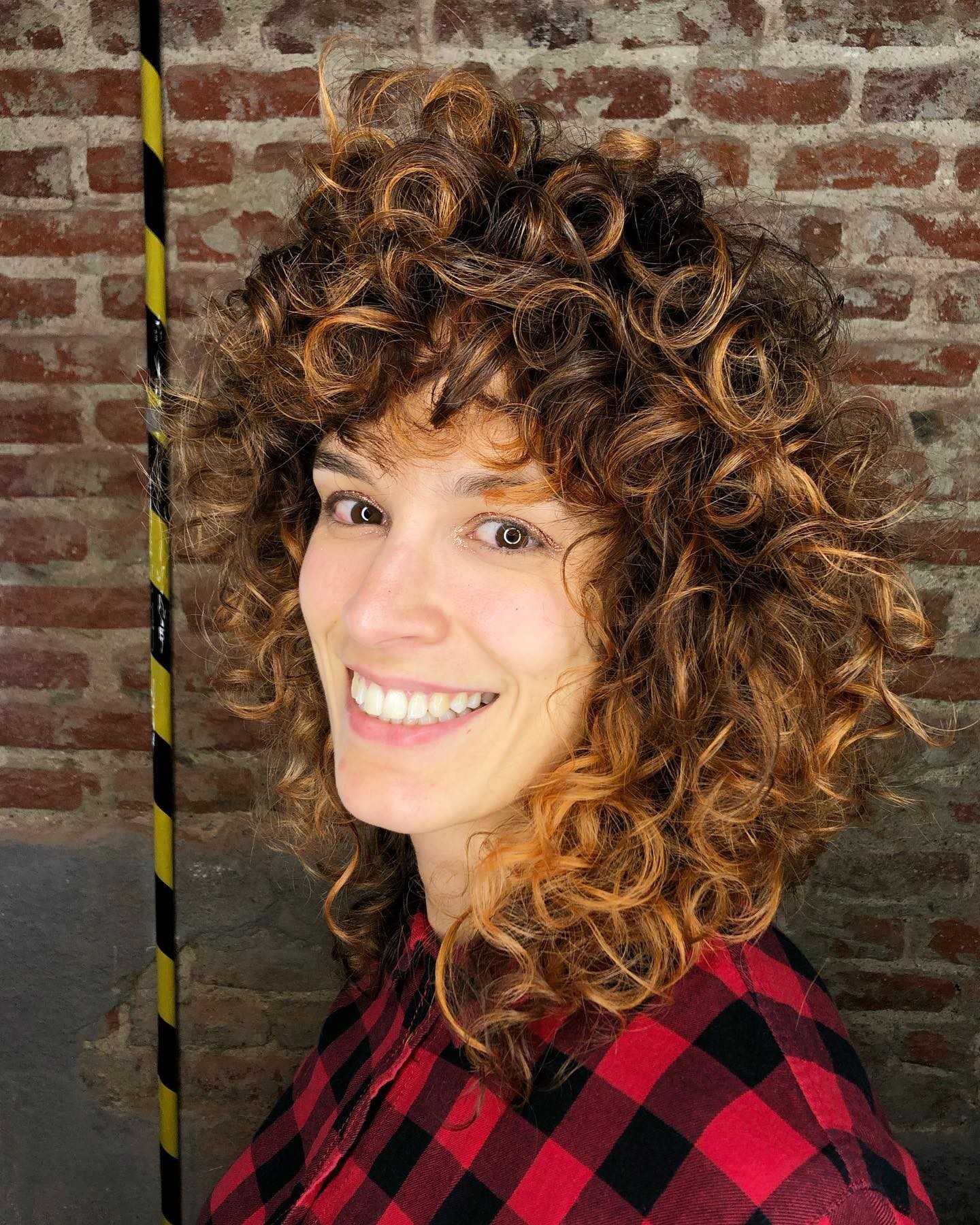 The Spirited Curly Shag With Volume