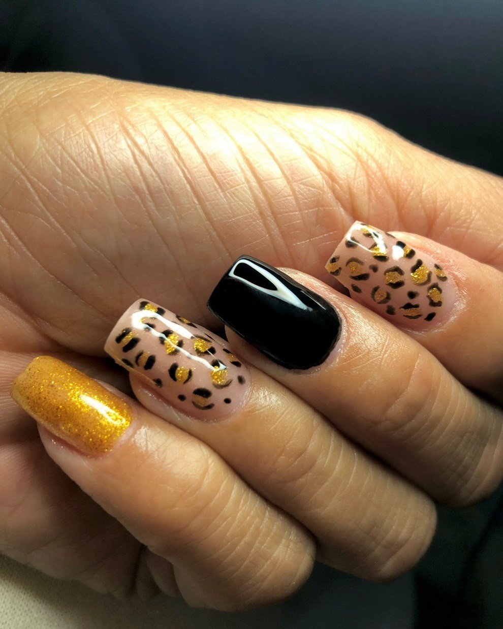 Black and Gold Leopard Nails