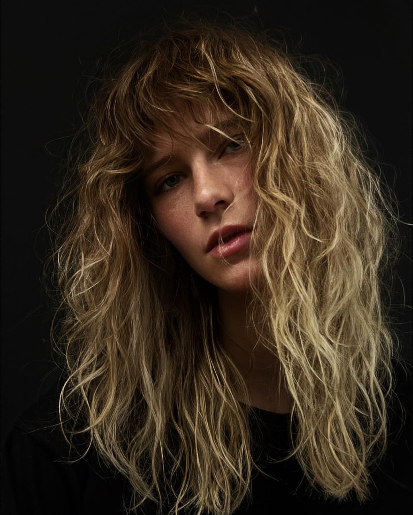 Modern Shag with Curly Bangs