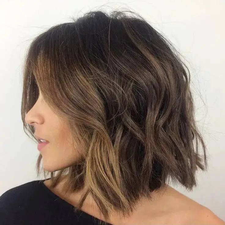 The Dynamic Contour: Angled and Artistic Bob