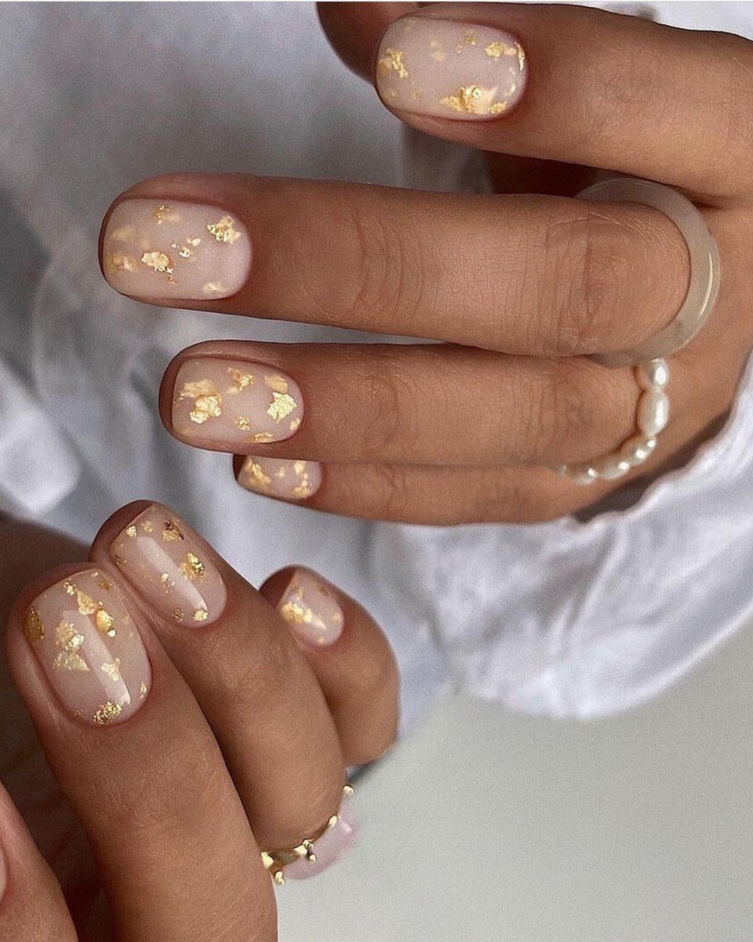 Ethereal Elegance: Gold Flecks and Transparency